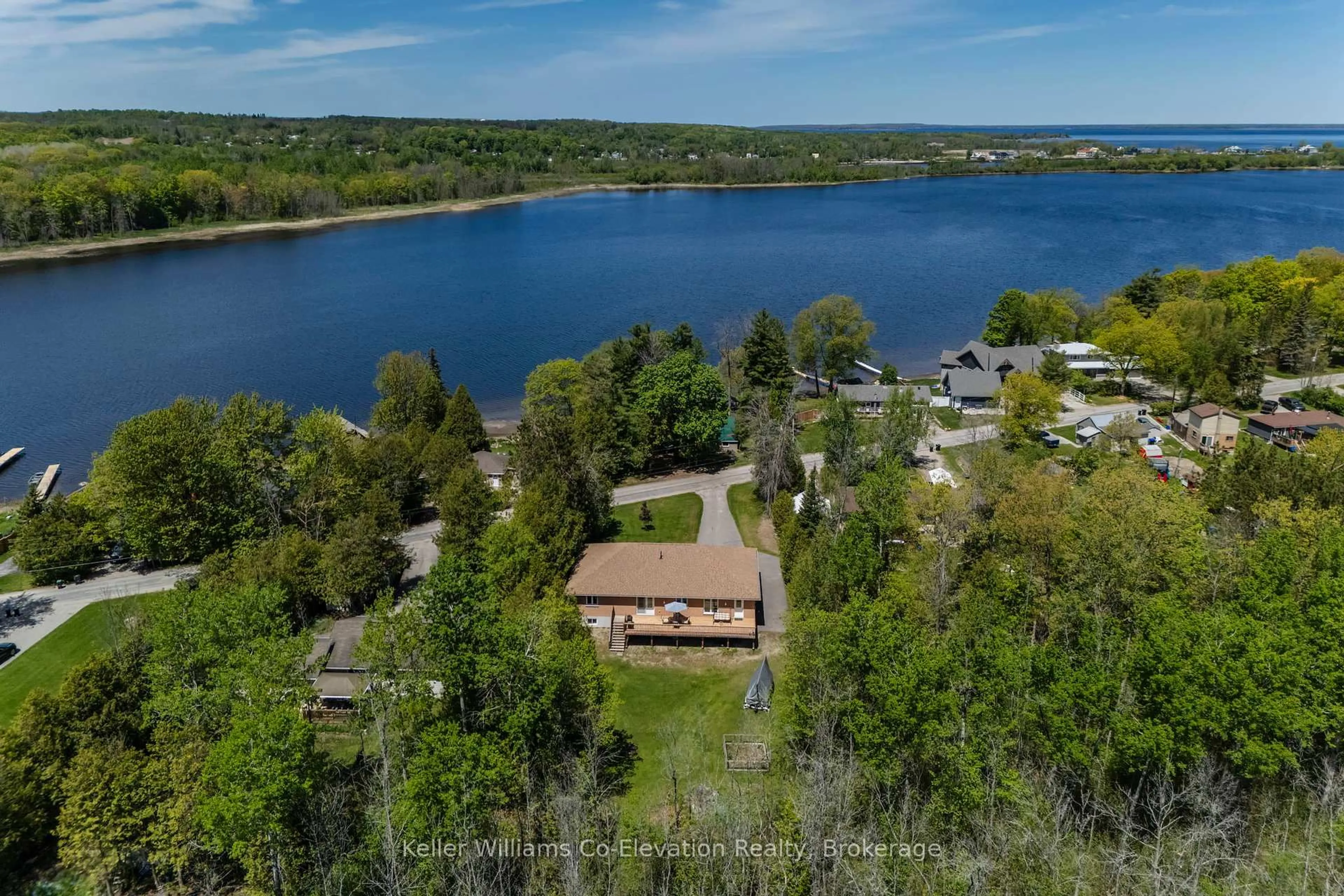 A pic from outside/outdoor area/front of a property/back of a property/a pic from drone, water/lake/river/ocean view for 115 Mitchell's Beach Rd, Tay Ontario L0K 2A0