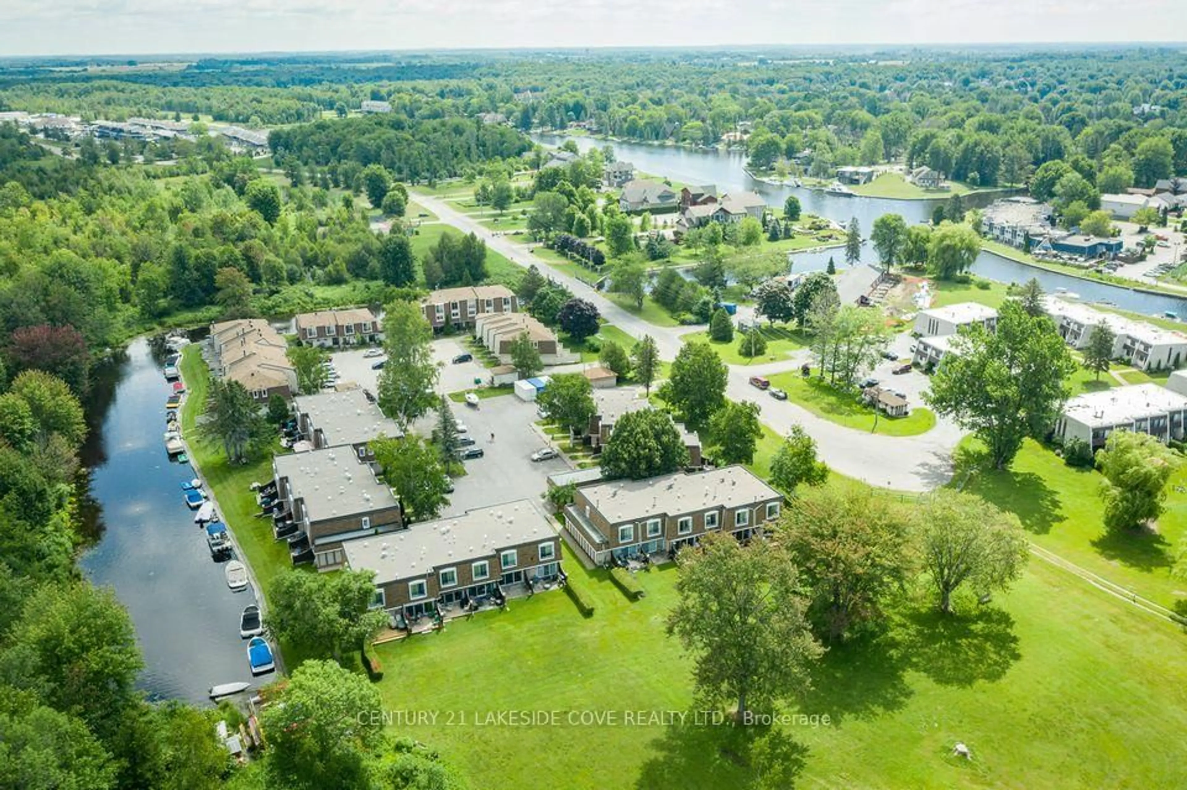 A pic from outside/outdoor area/front of a property/back of a property/a pic from drone, water/lake/river/ocean view for 2 Paradise Blvd #Unit 16, Ramara Ontario L0K 1B0