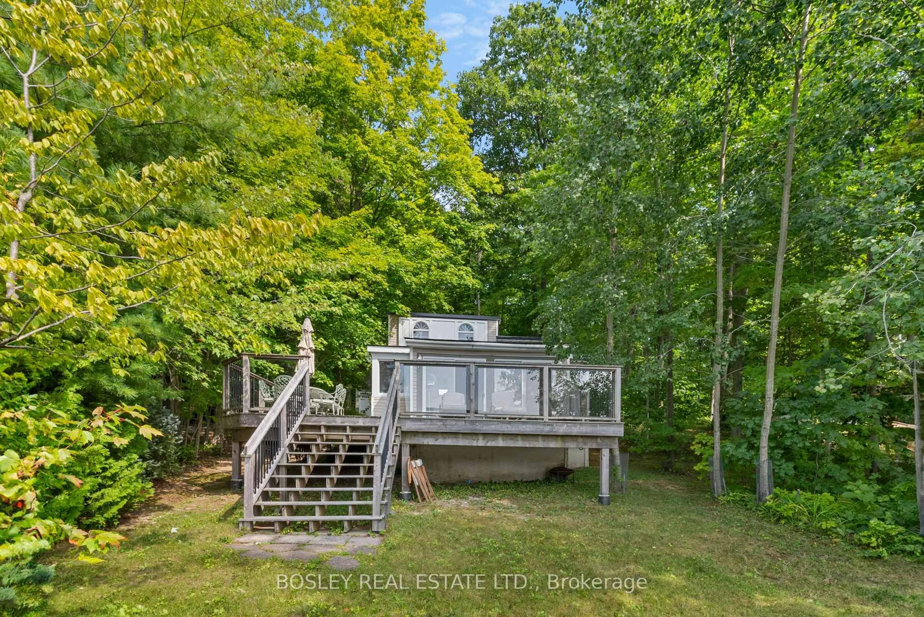 A pic from outside/outdoor area/front of a property/back of a property/a pic from drone, water/lake/river/ocean view for 150 Farlain Lake Rd #Cottage, Tiny Ontario L9M 0B5
