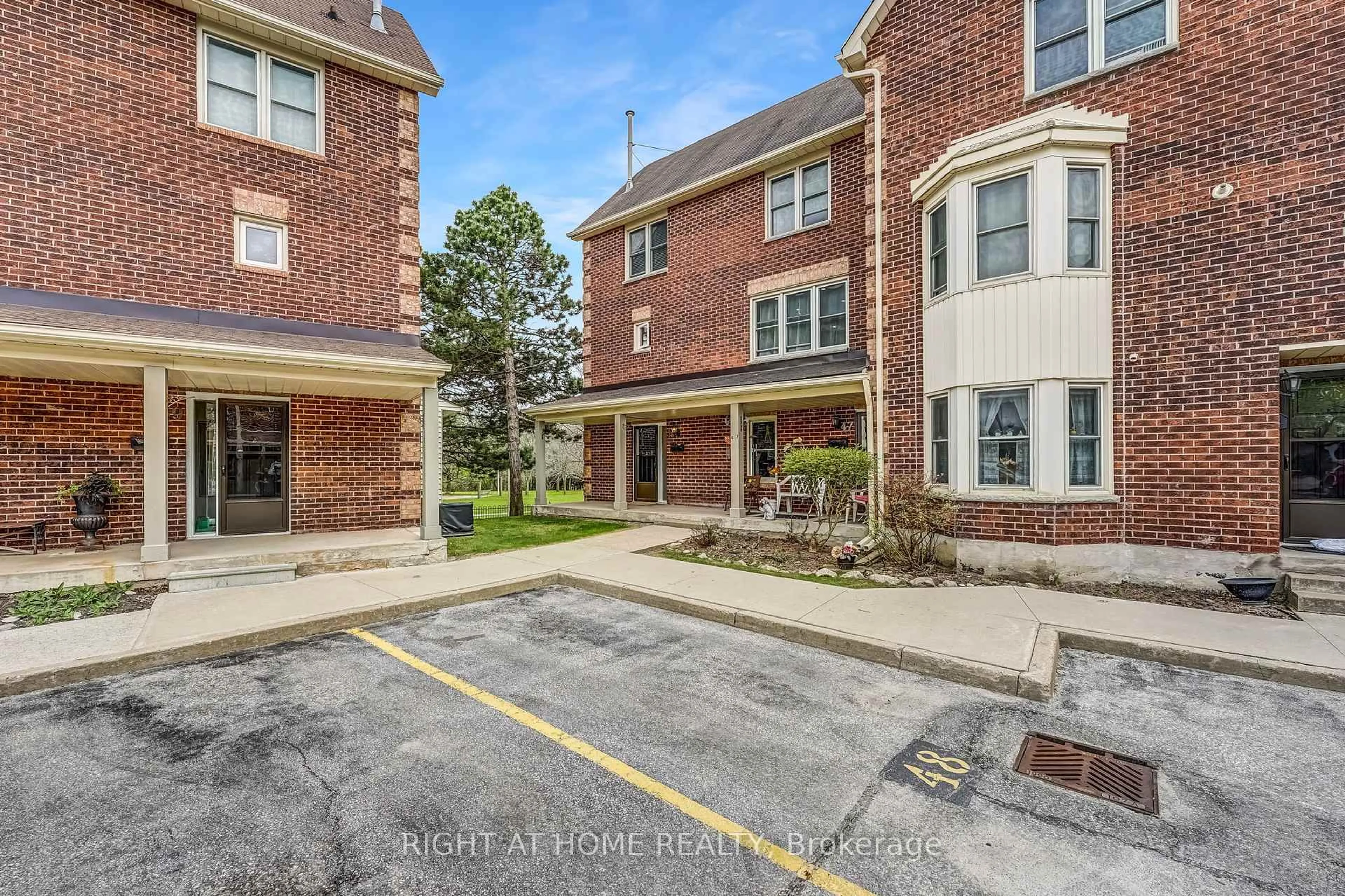 Home with brick exterior material, street for 119 D'ambrosio Dr #48, Barrie Ontario L4N 7R7