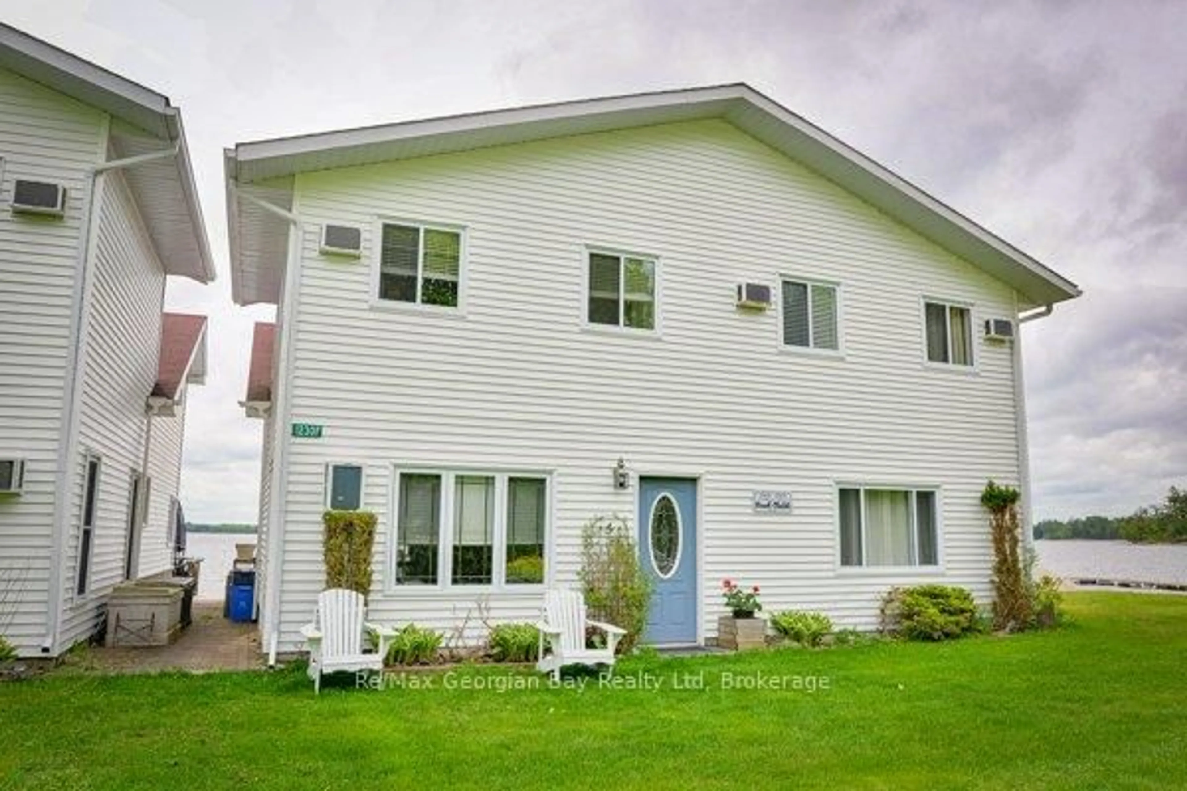 Home with vinyl exterior material, street for 1230 GRANDVIEW LODGE Rd #Beach Chalet #3, Severn Ontario P0E 1N0