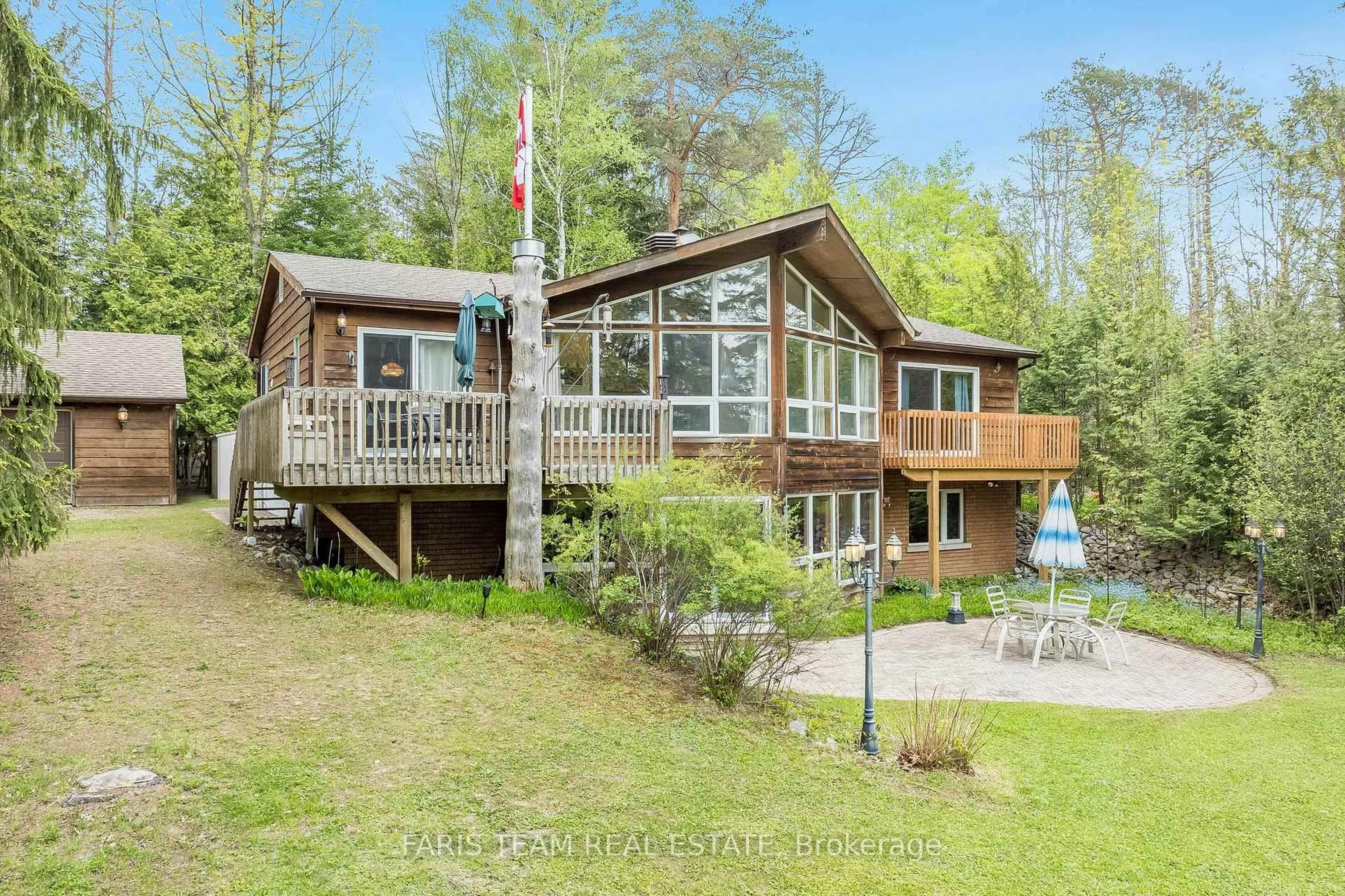 A pic from outside/outdoor area/front of a property/back of a property/a pic from drone, water/lake/river/ocean view for 2385 Whetham Rd, Springwater Ontario L0L 1P0