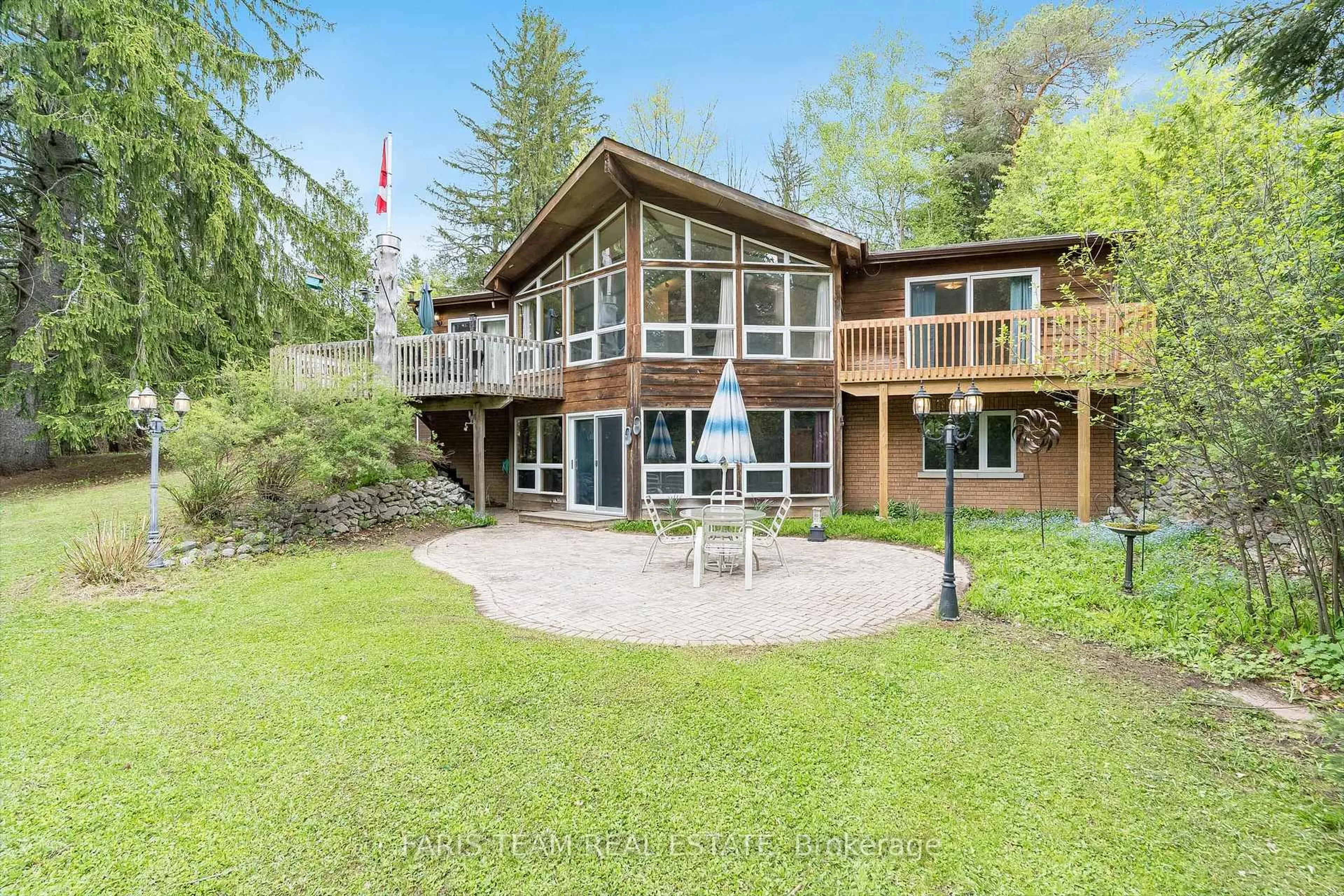 A pic from outside/outdoor area/front of a property/back of a property/a pic from drone, water/lake/river/ocean view for 2385 Whetham Rd, Springwater Ontario L0L 1P0