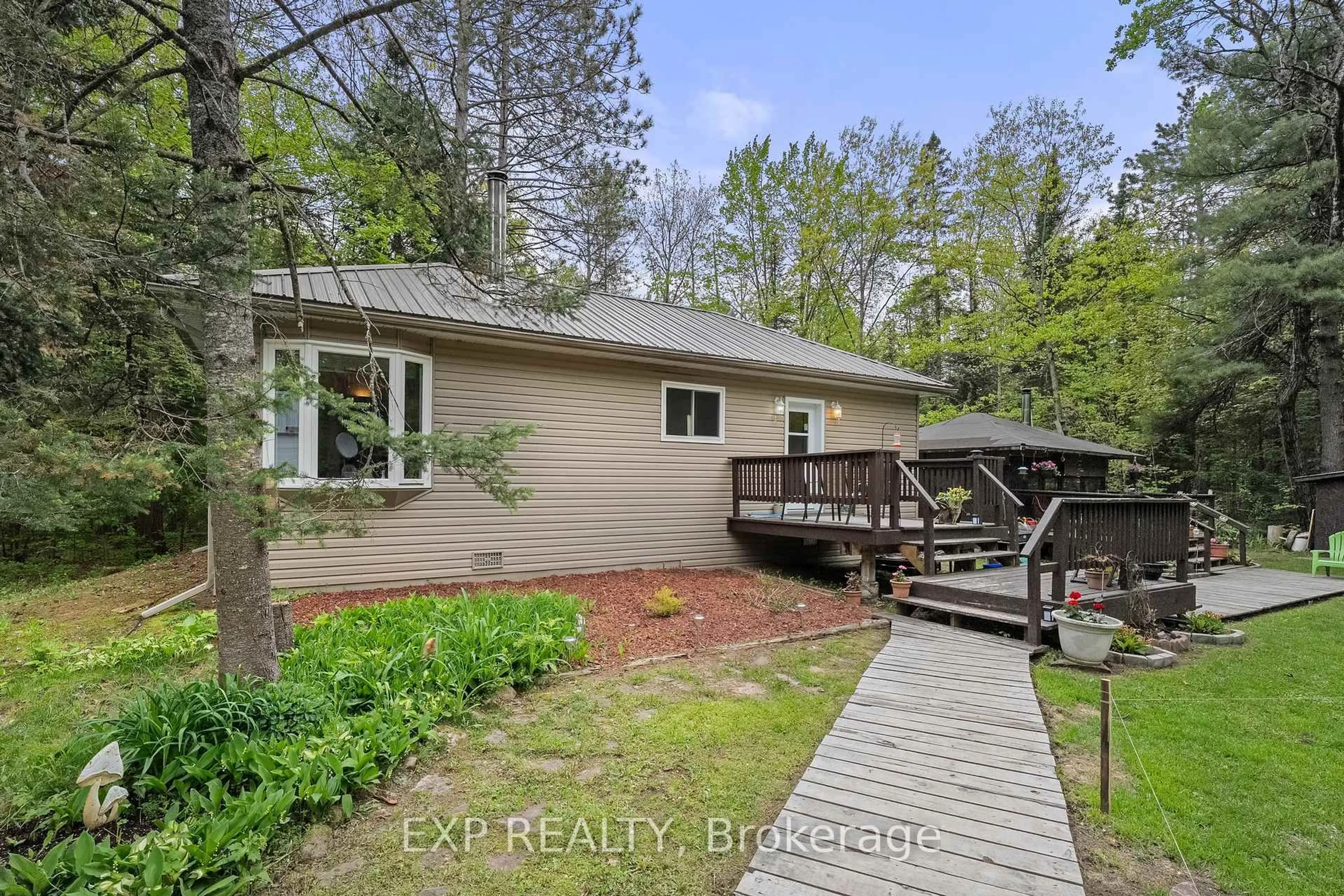 A pic from outside/outdoor area/front of a property/back of a property/a pic from drone, water/lake/river/ocean view for 6566 Pioneer Village Lane, Ramara Ontario L0K 1W0