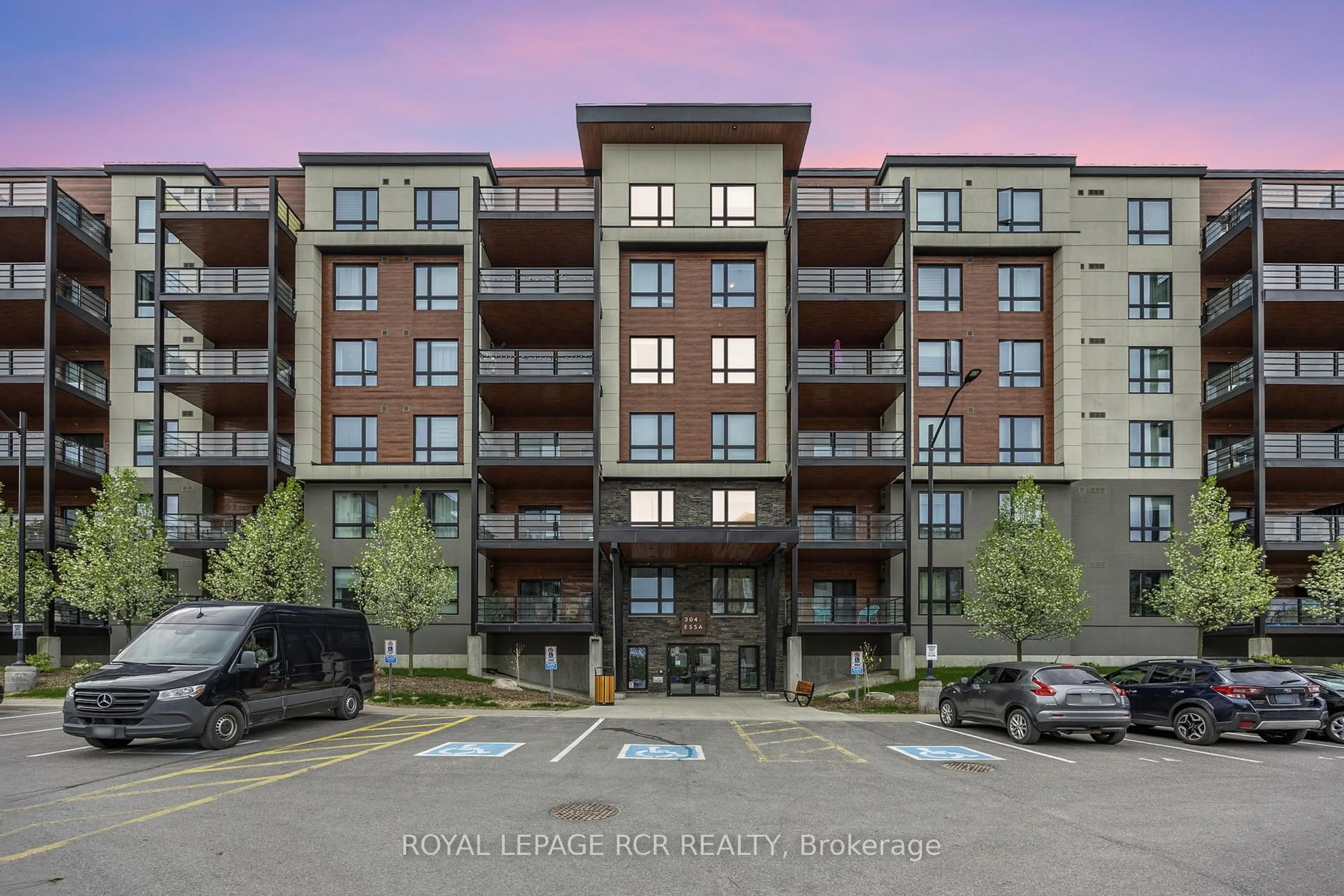 A pic from outside/outdoor area/front of a property/back of a property/a pic from drone, unknown for 304 Essa Rd #203, Barrie Ontario L9J 0H4