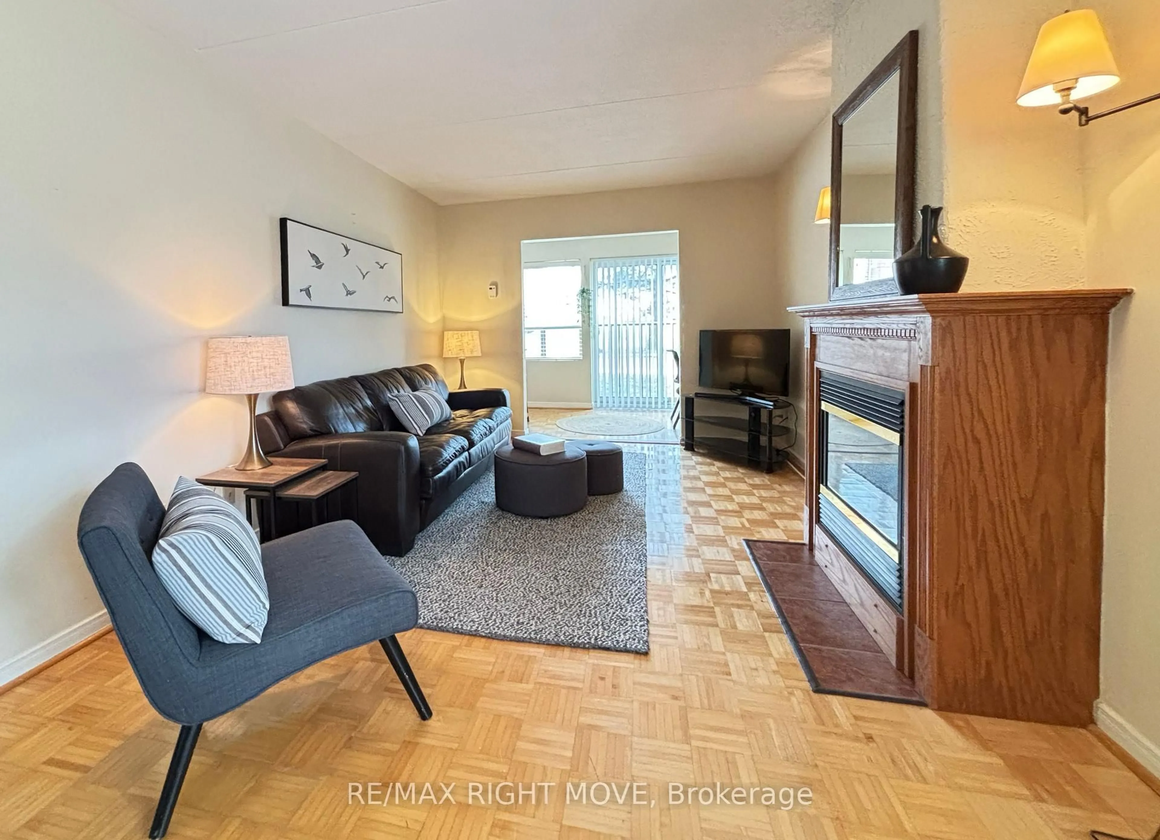 Living room with furniture, unknown for 54 Fittons Rd #103, Orillia Ontario L3V 3T9