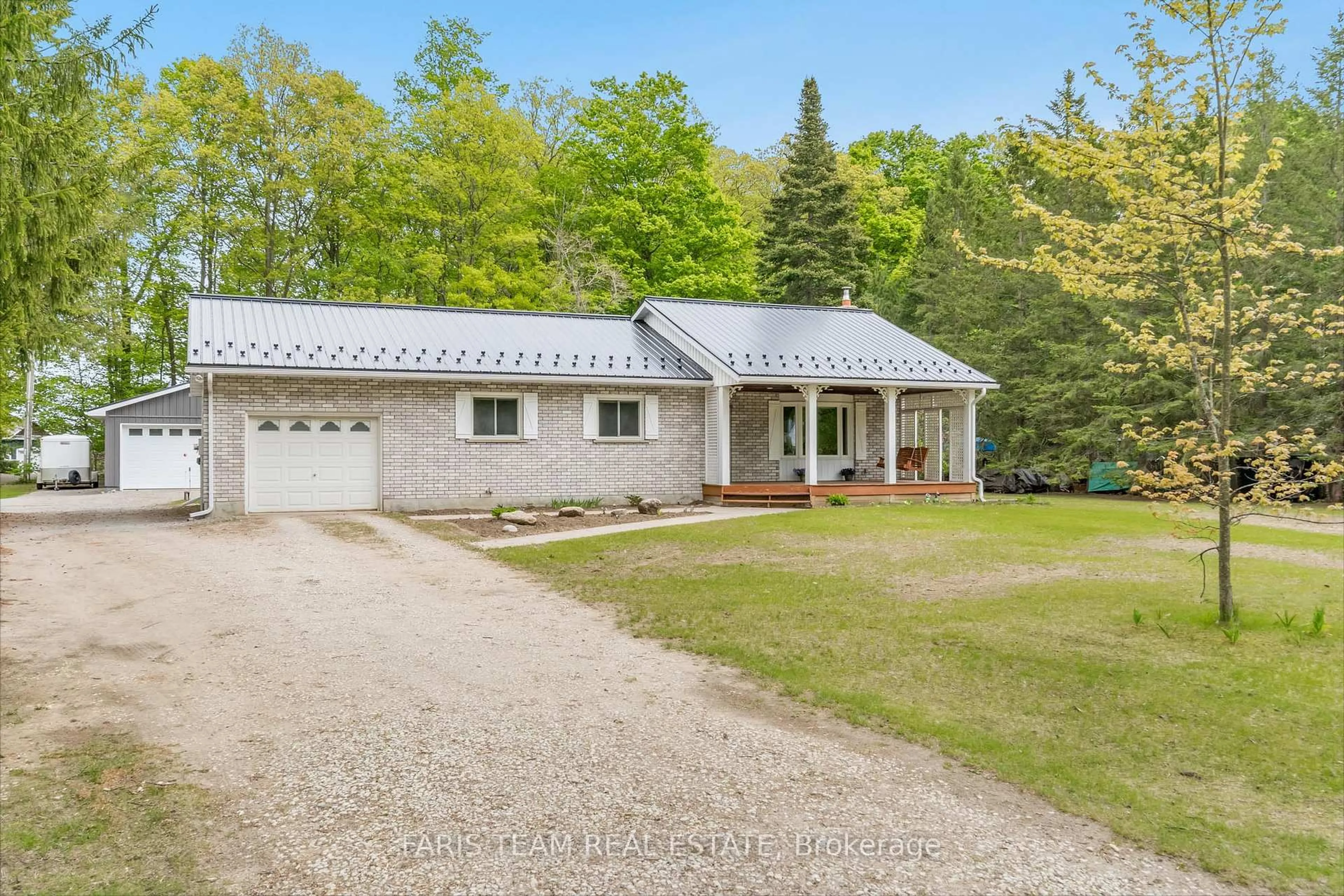 A pic from outside/outdoor area/front of a property/back of a property/a pic from drone, unknown for 1941 Vespra Valley Rd, Springwater Ontario L0L 1Y2