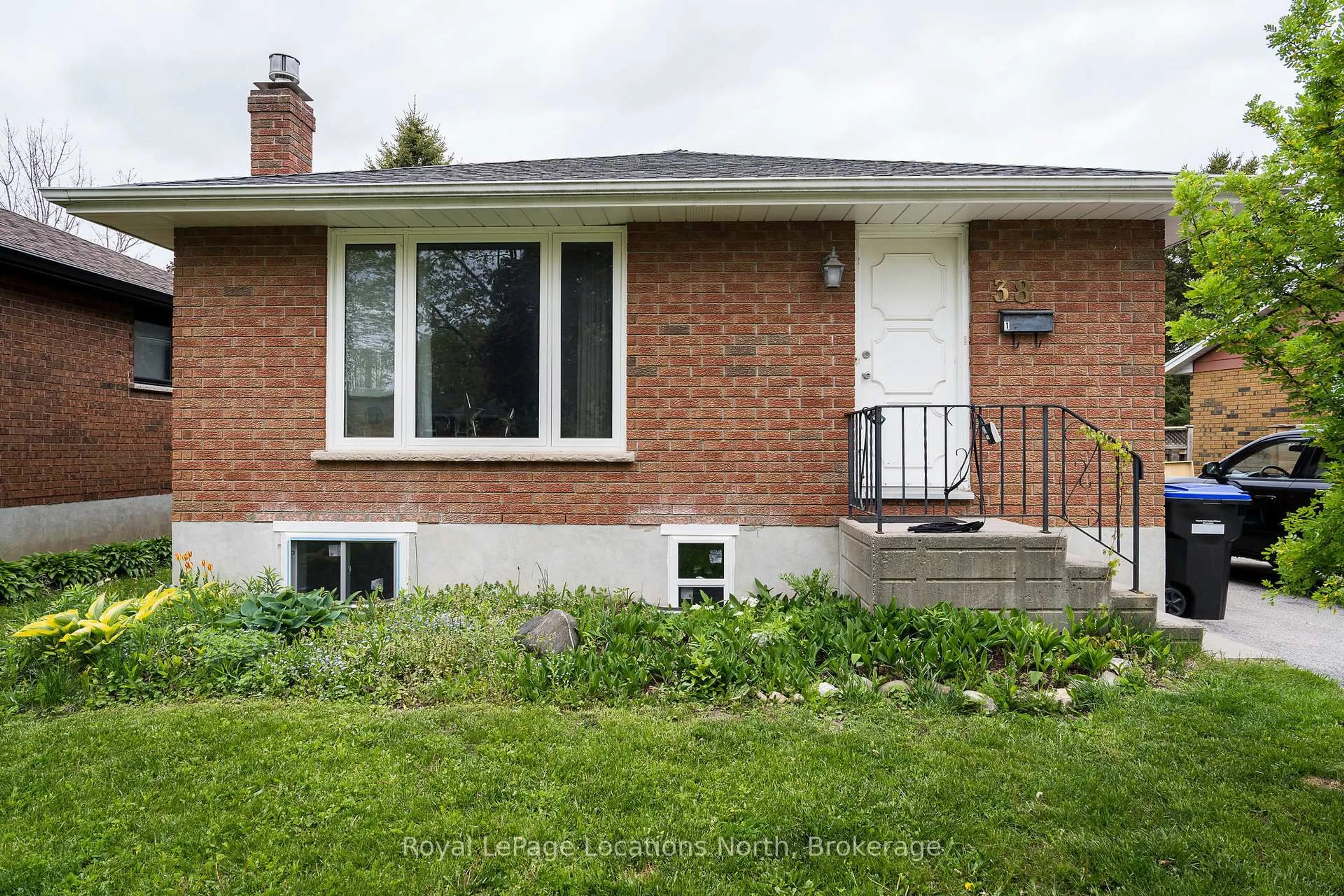 Home with brick exterior material, street for 38 Sproule Ave, Collingwood Ontario L9Y 4L5