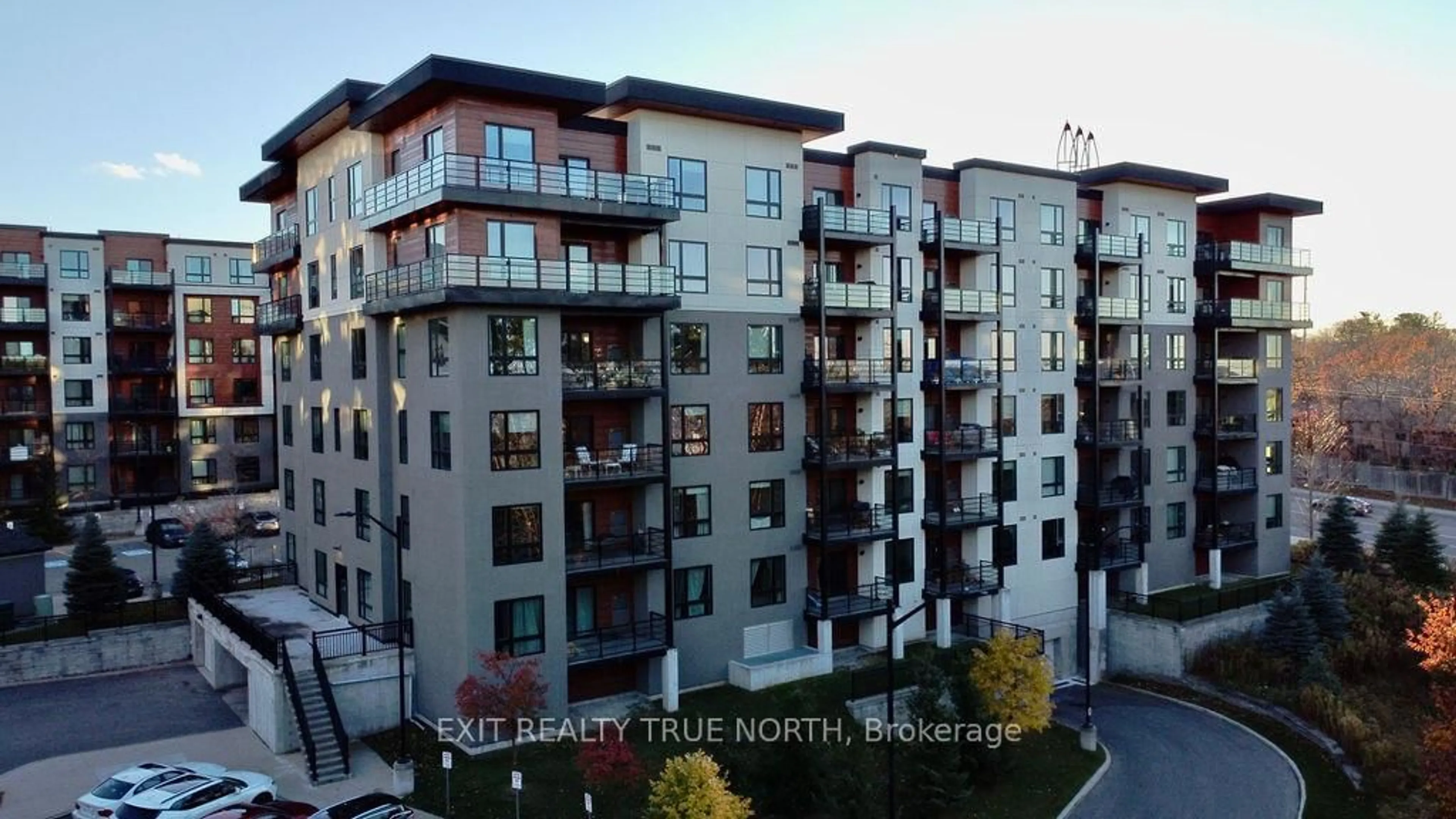 A pic from outside/outdoor area/front of a property/back of a property/a pic from drone, unknown for 300 Essa Rd #303, Barrie Ontario L9J 0B9