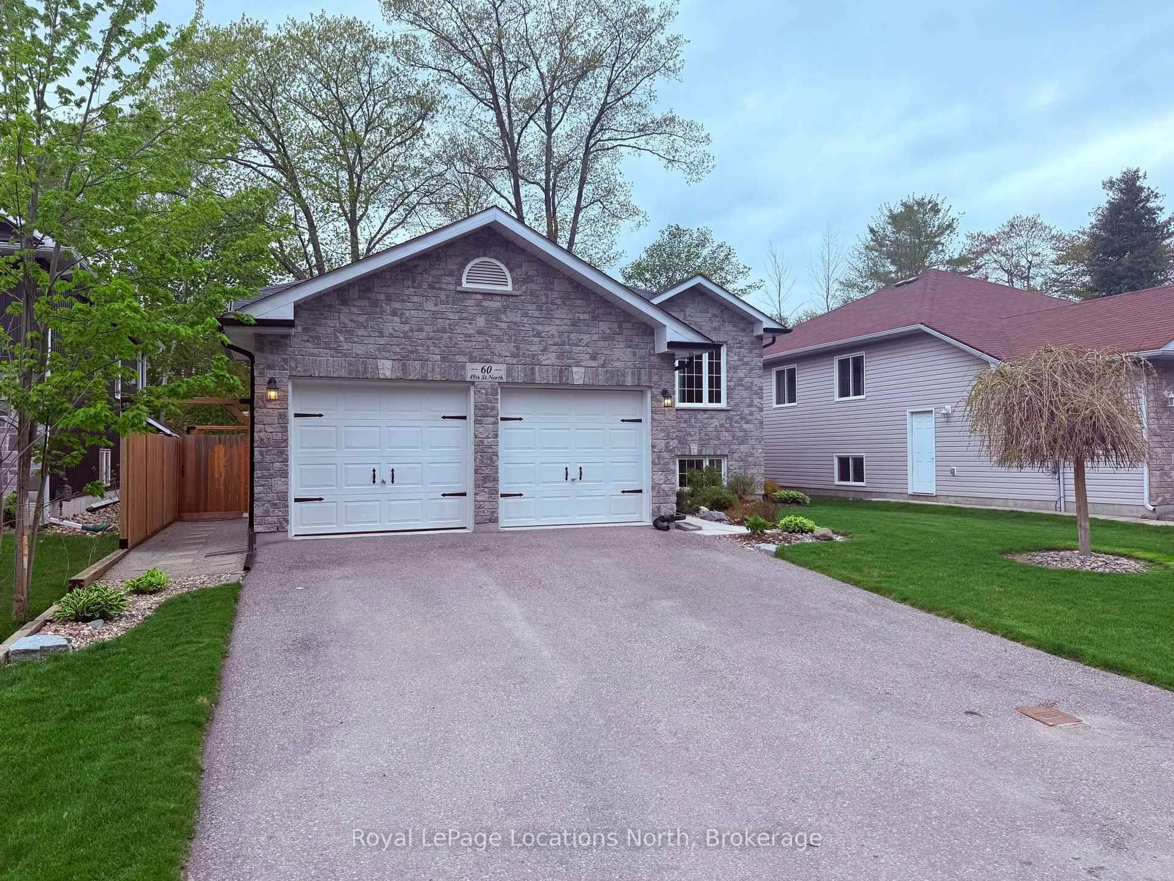 Home with brick exterior material, street for 60 49TH St, Wasaga Beach Ontario L9Z 1Y1