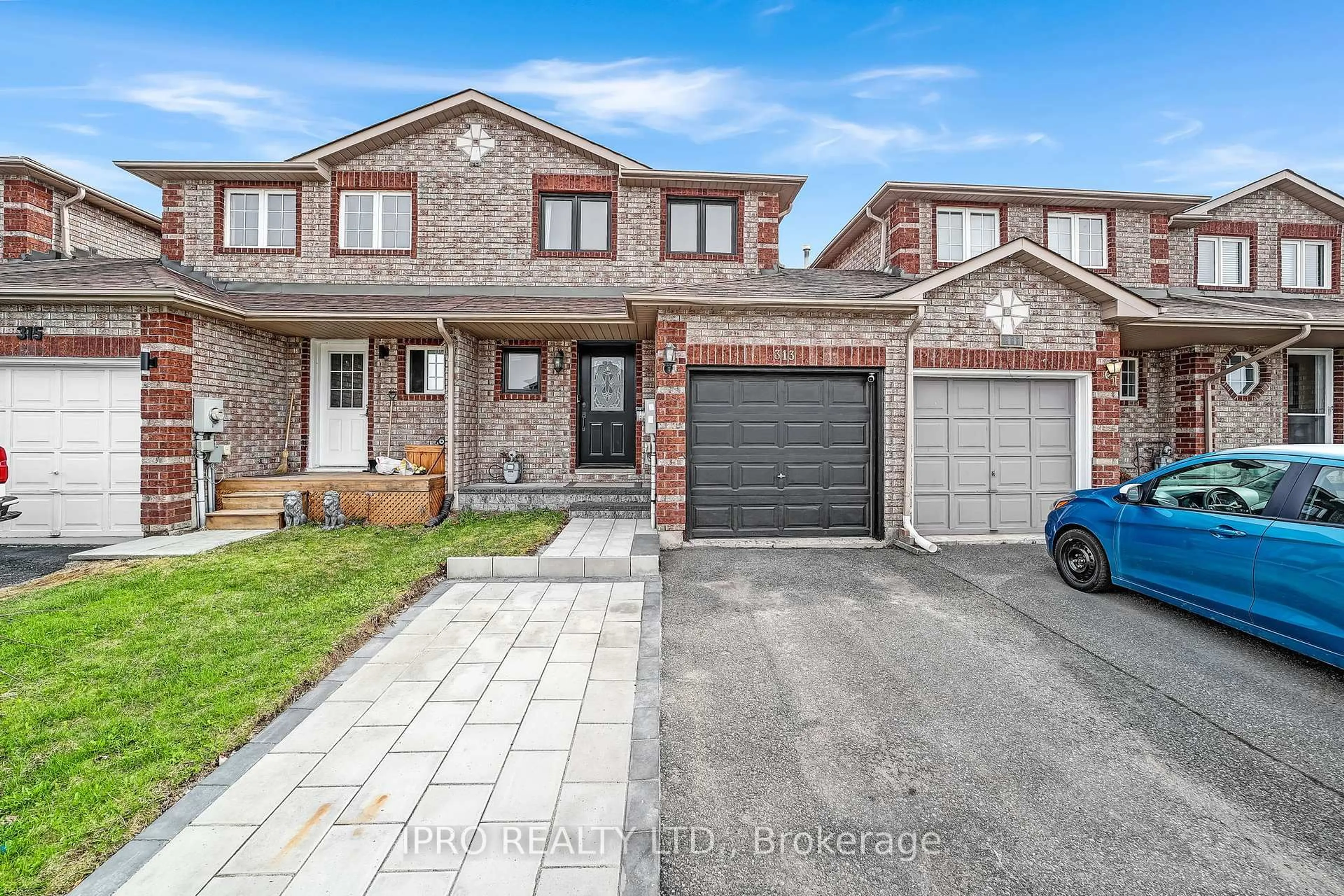 Home with brick exterior material, street for 313 Dunsmore Lane, Barrie Ontario L4M 7A8