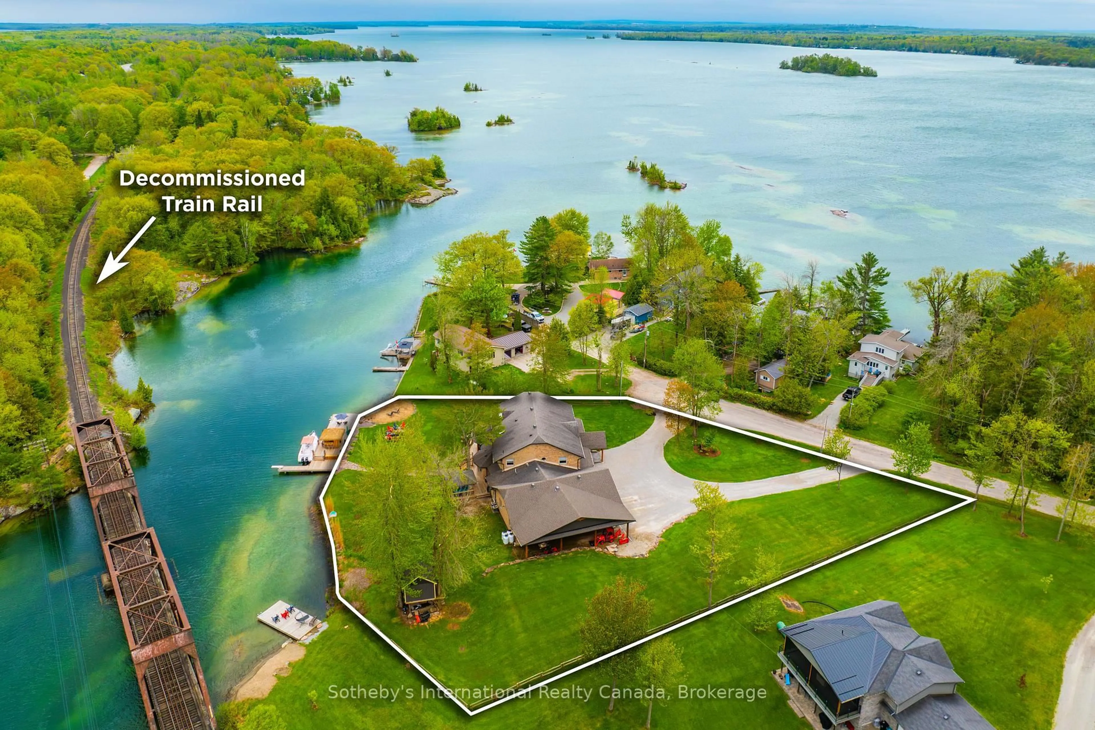 A pic from outside/outdoor area/front of a property/back of a property/a pic from drone, water/lake/river/ocean view for 7583 Oak Point Rd, Severn Ontario L0K 2B0