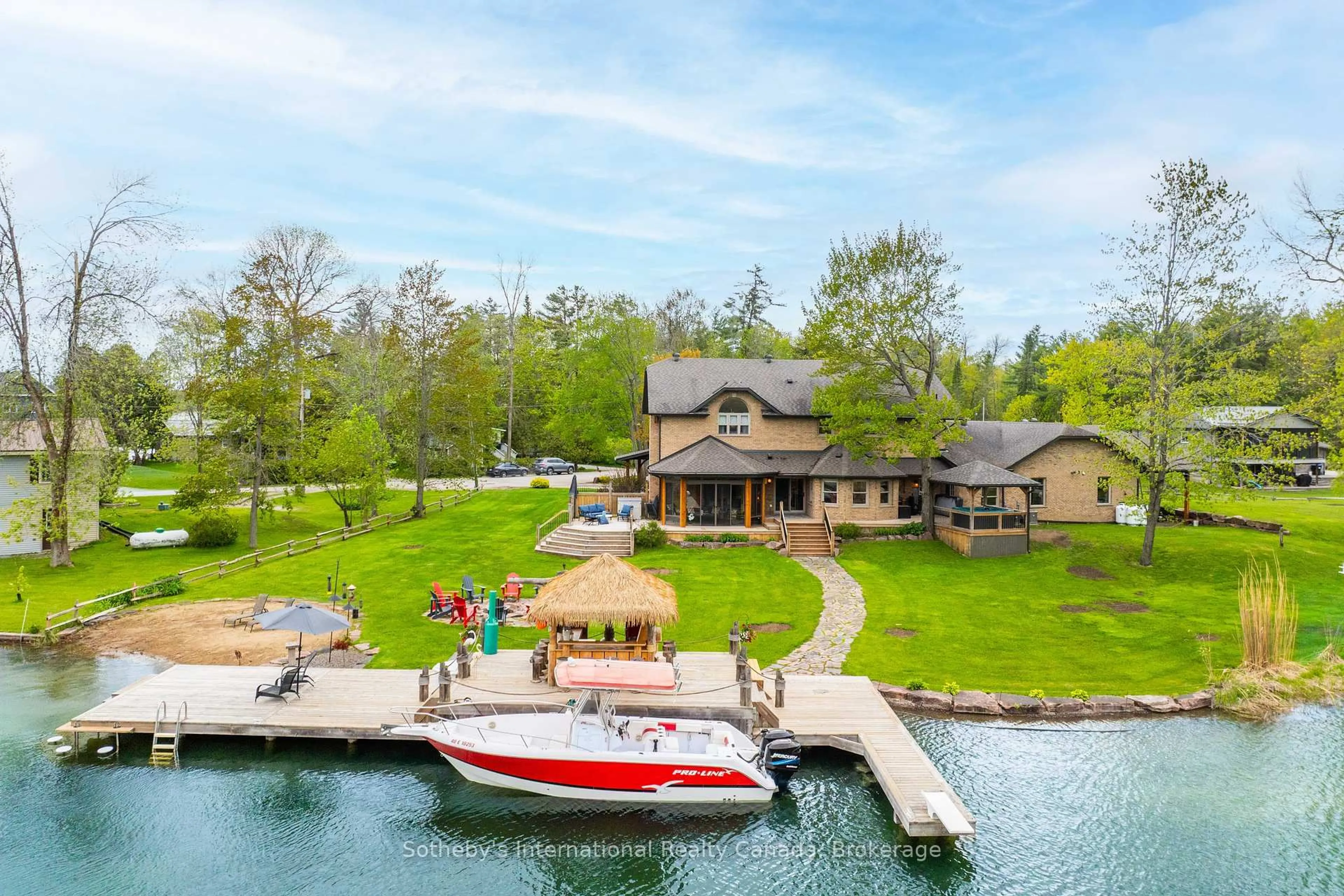 A pic from outside/outdoor area/front of a property/back of a property/a pic from drone, water/lake/river/ocean view for 7583 Oak Point Rd, Severn Ontario L0K 2B0