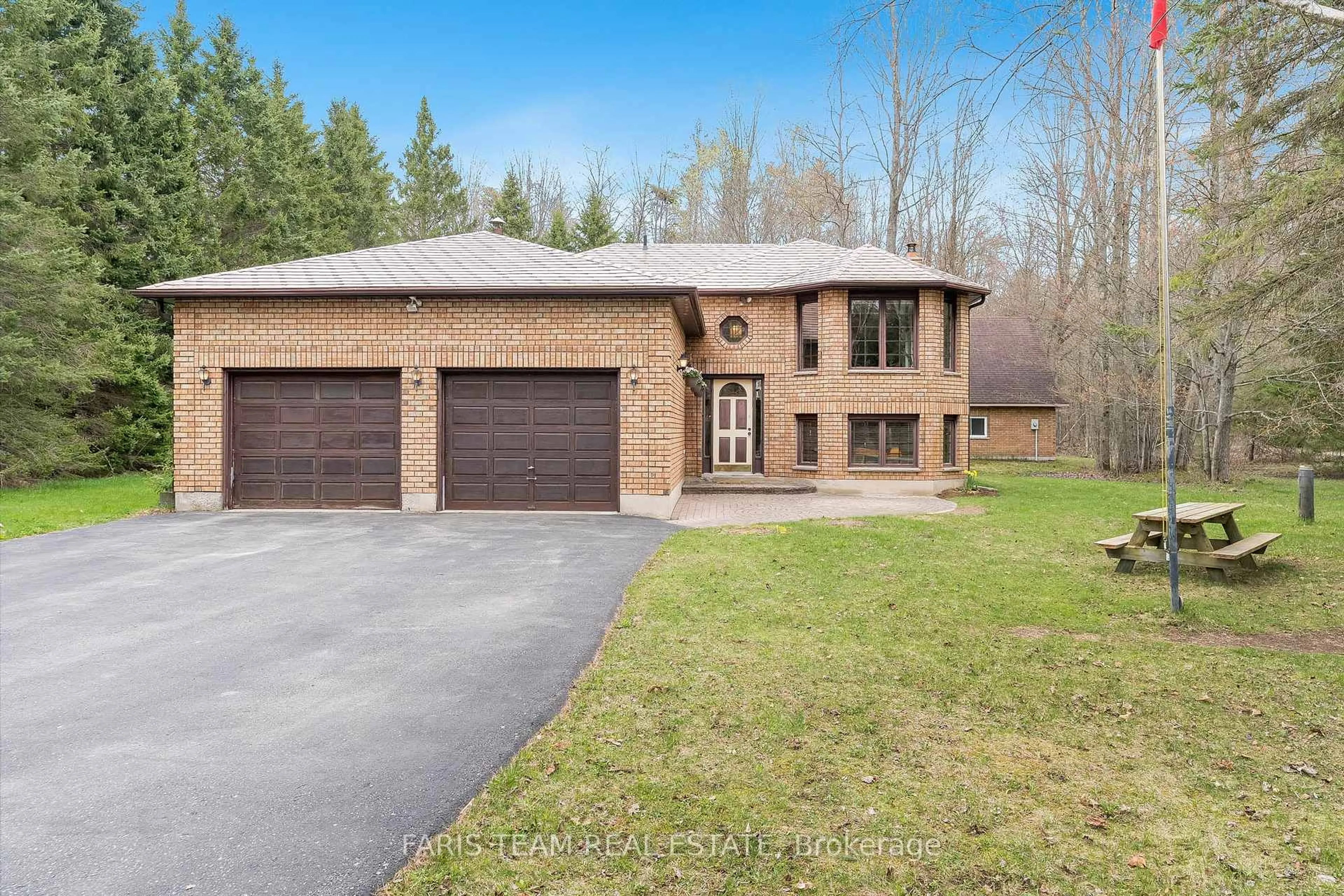 Home with brick exterior material, street for 1091 Fox Farm Rd, Springwater Ontario L0L 2K0