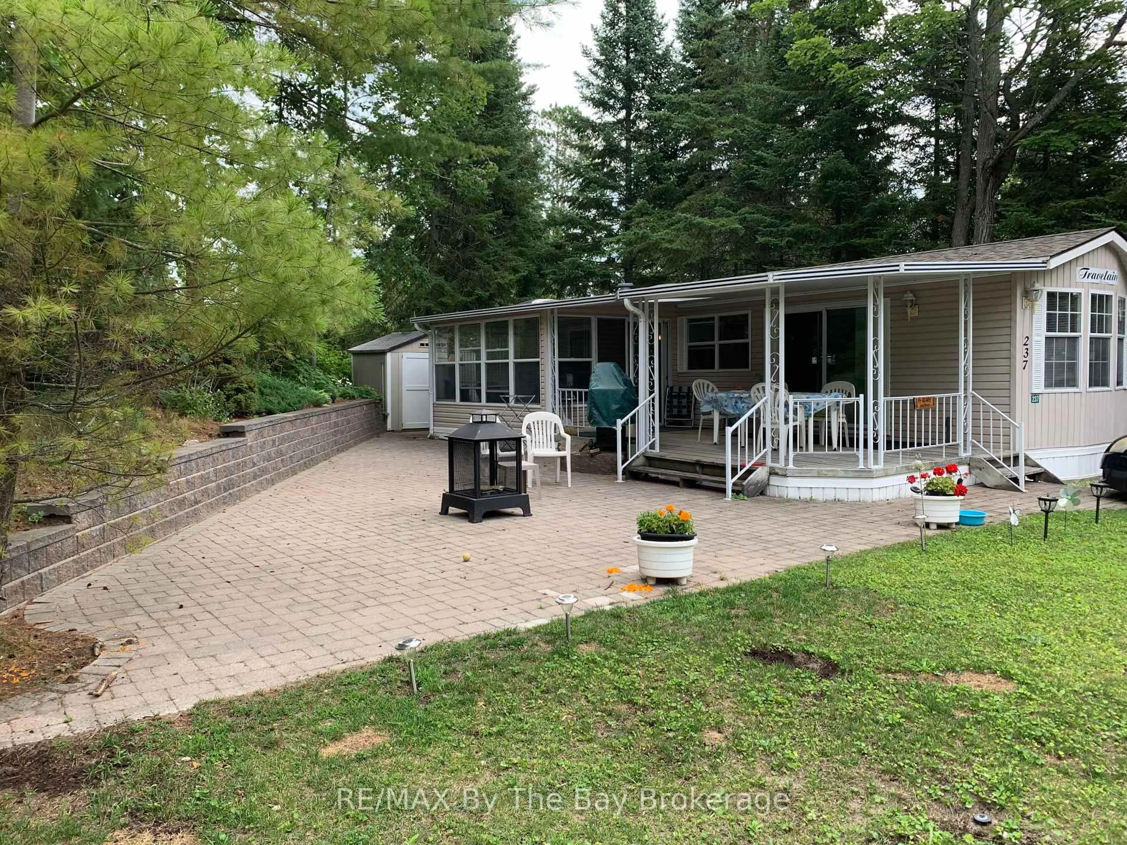 A pic from outside/outdoor area/front of a property/back of a property/a pic from drone, water/lake/river/ocean view for 85 Theme Park Dr #237, Wasaga Beach Ontario L9Z 1X7
