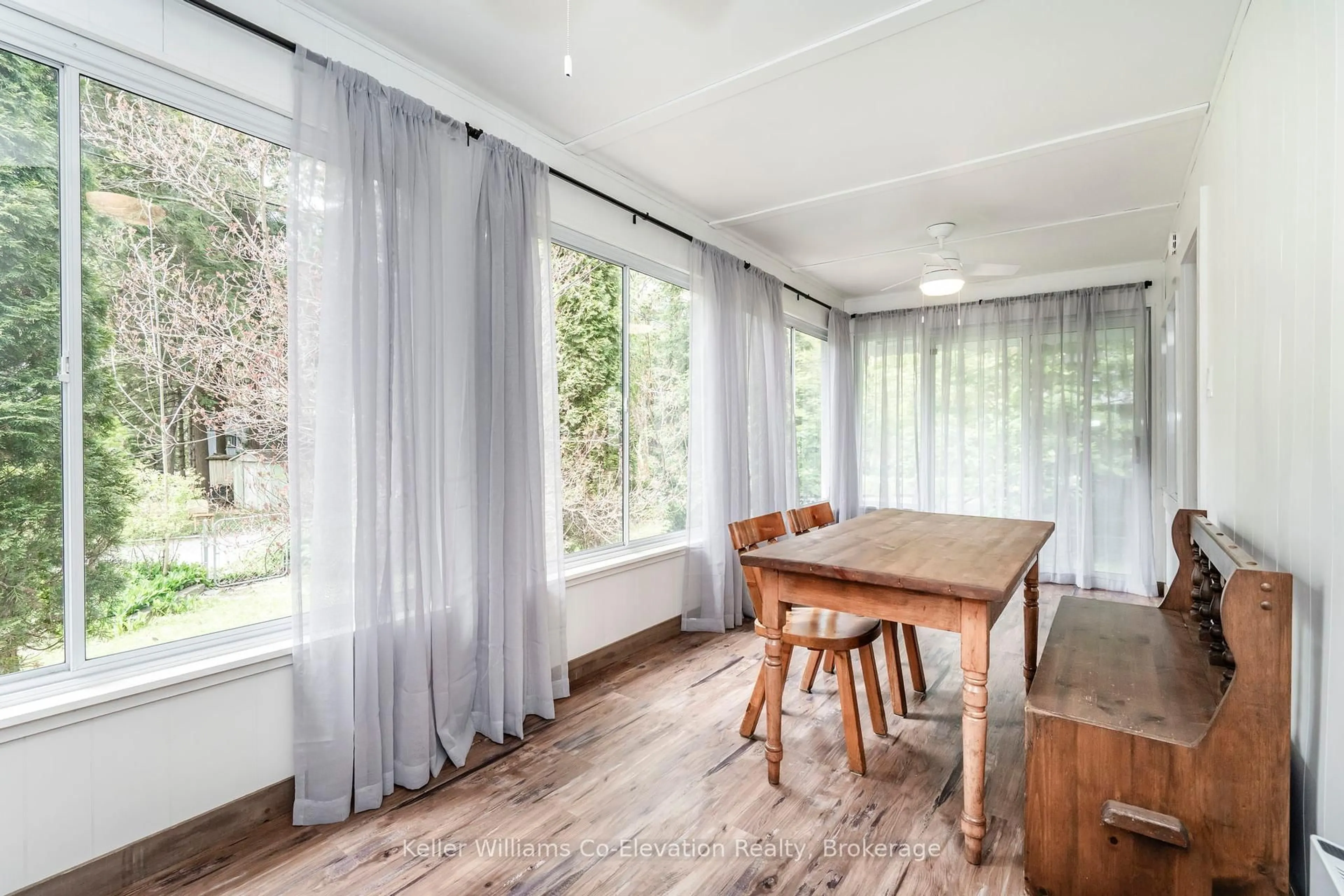 Dining room, wood/laminate floor for 135 Oliver Dr, Tiny Ontario L0L 2J0
