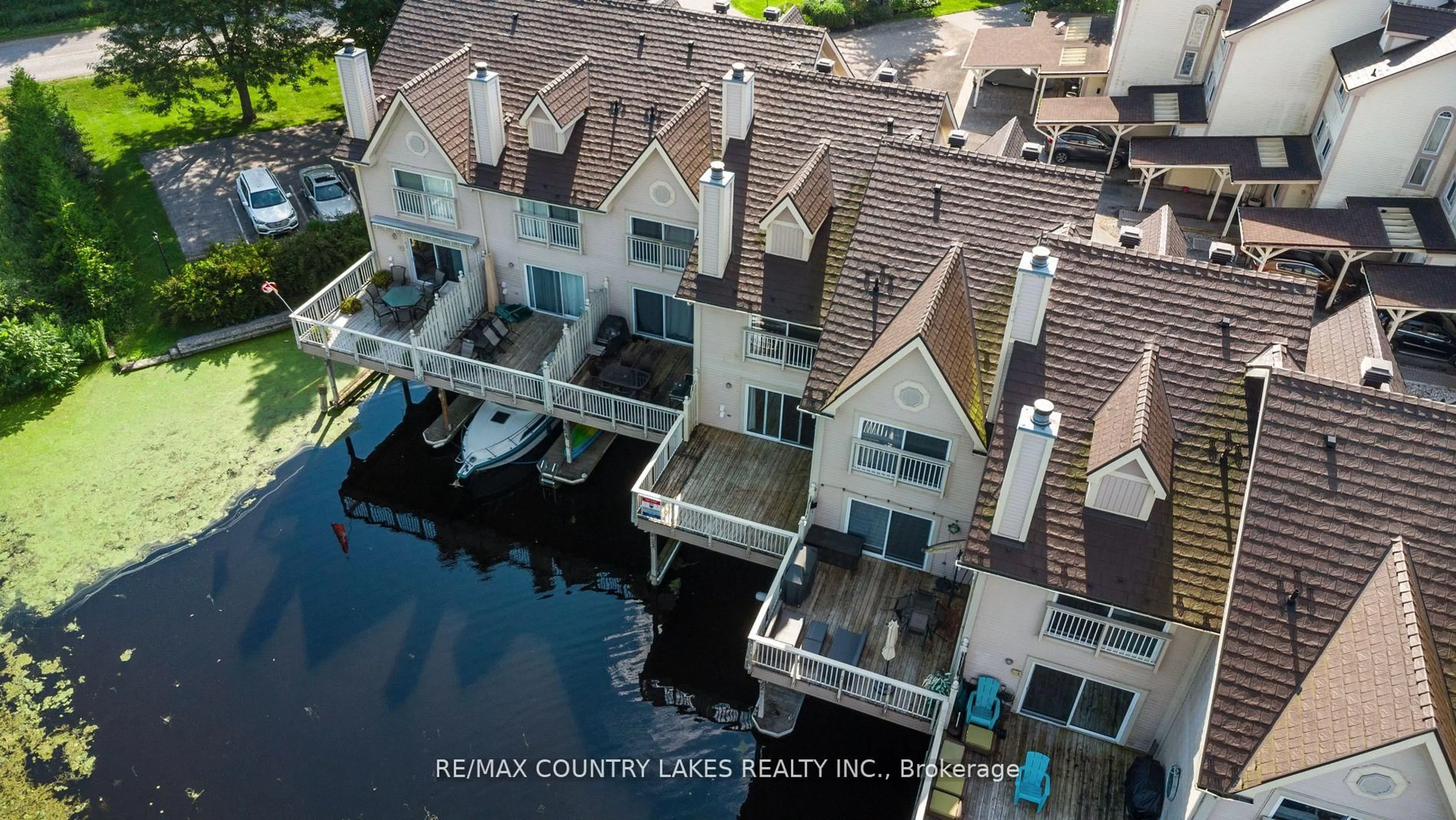 A pic from outside/outdoor area/front of a property/back of a property/a pic from drone, water/lake/river/ocean view for 100 Laguna Pkwy #22, Ramara Ontario L0K 1B0