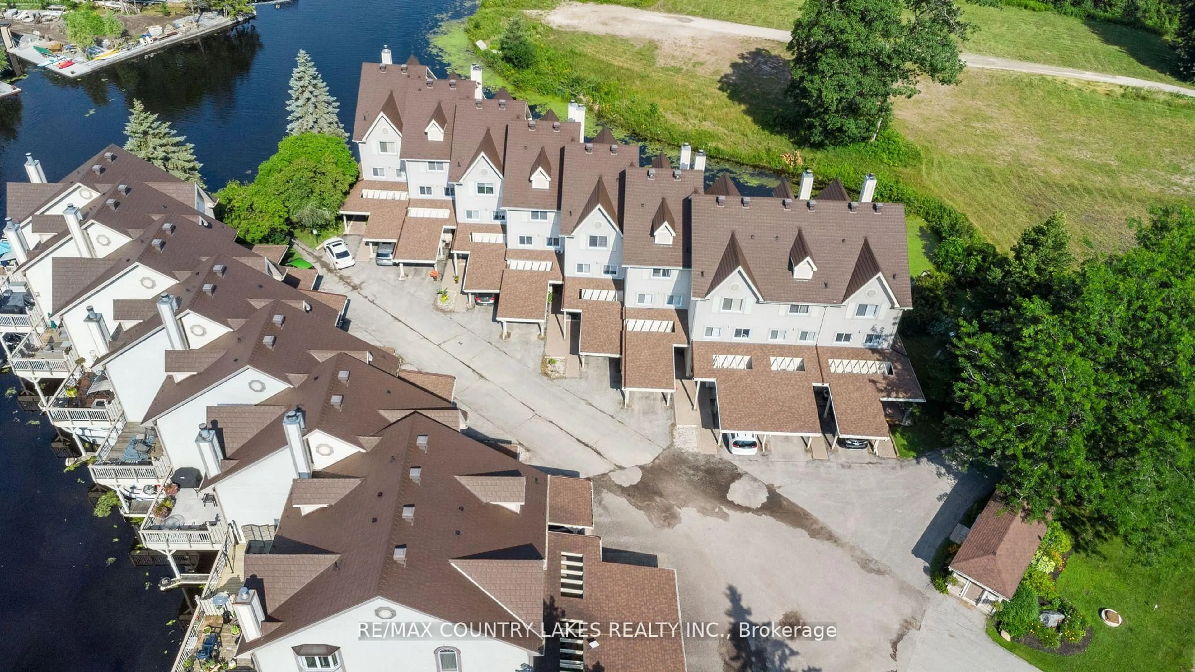 A pic from outside/outdoor area/front of a property/back of a property/a pic from drone, water/lake/river/ocean view for 100 Laguna Pkwy #22, Ramara Ontario L0K 1B0