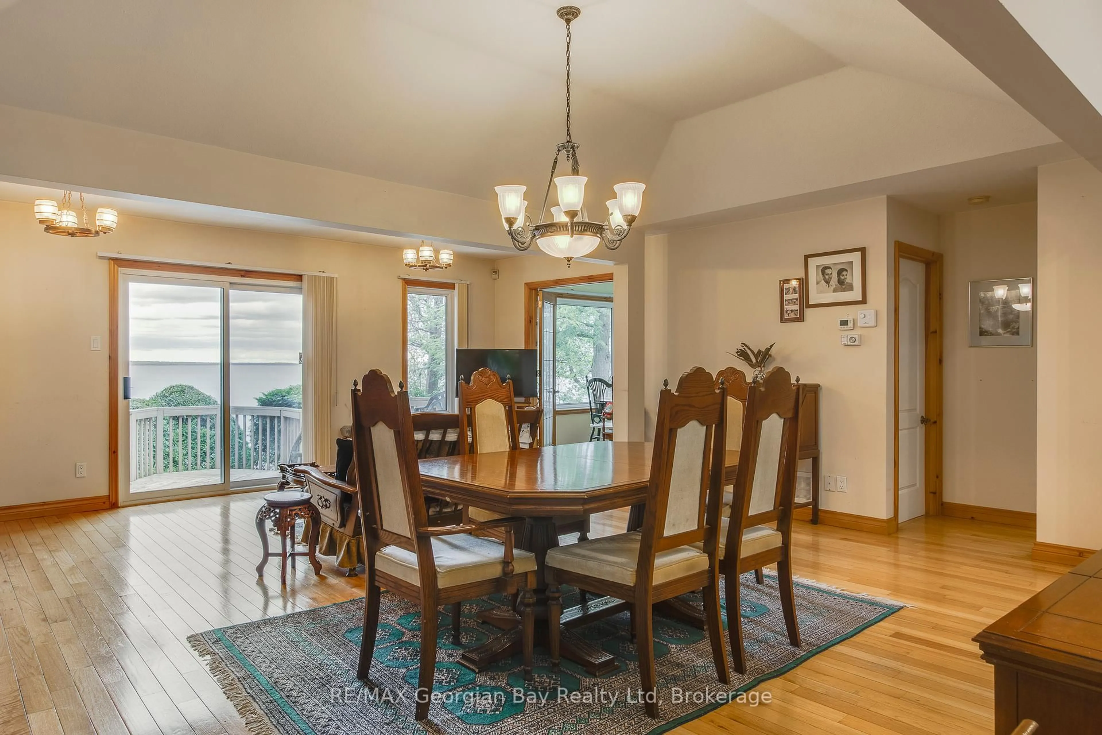 Dining room, wood/laminate floor for 25 Couchiching Cres, Tiny Ontario L9M 0C6
