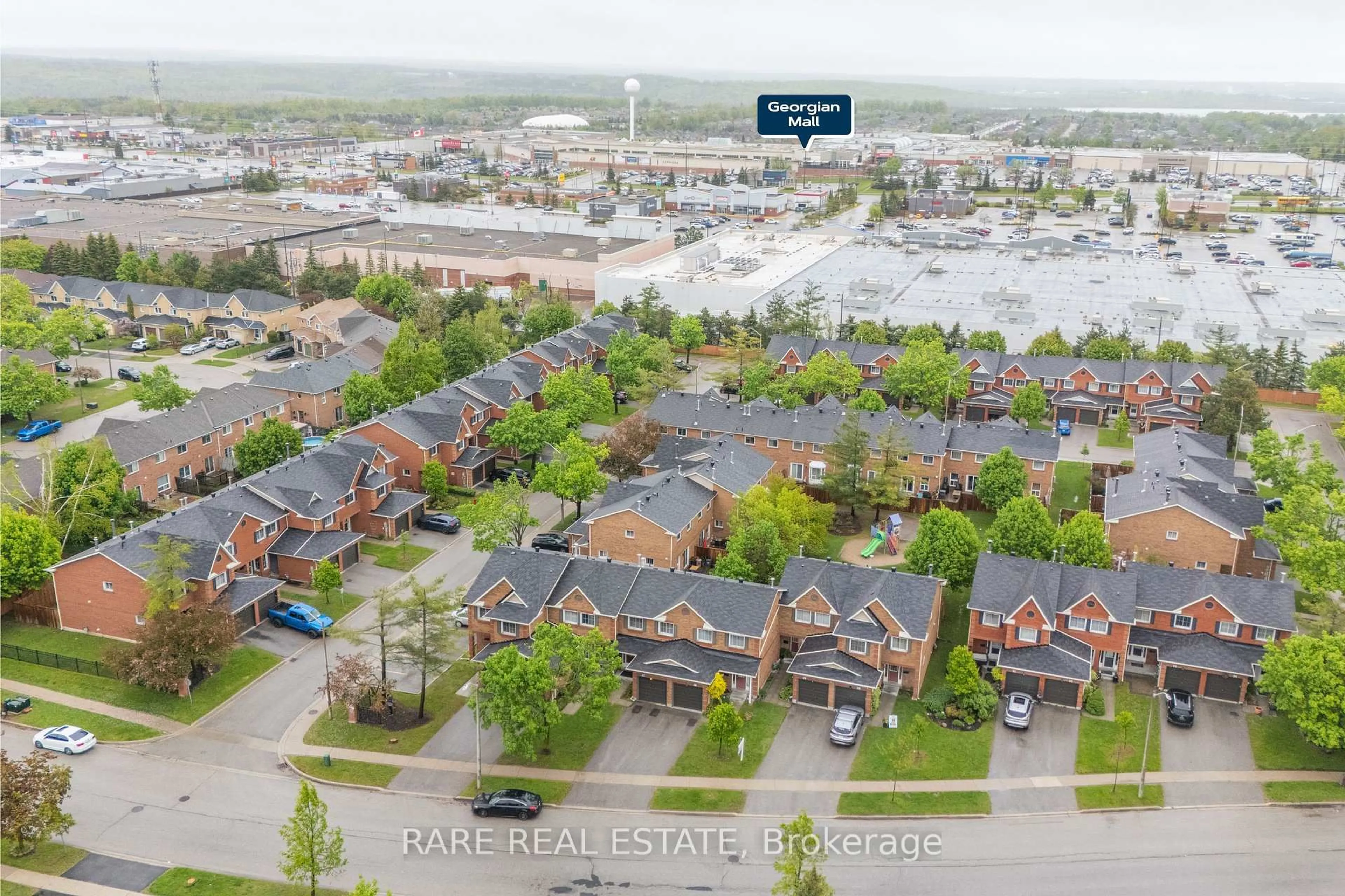 A pic from outside/outdoor area/front of a property/back of a property/a pic from drone, street for 165 Kozlov St #47, Barrie Ontario L4N 7M7
