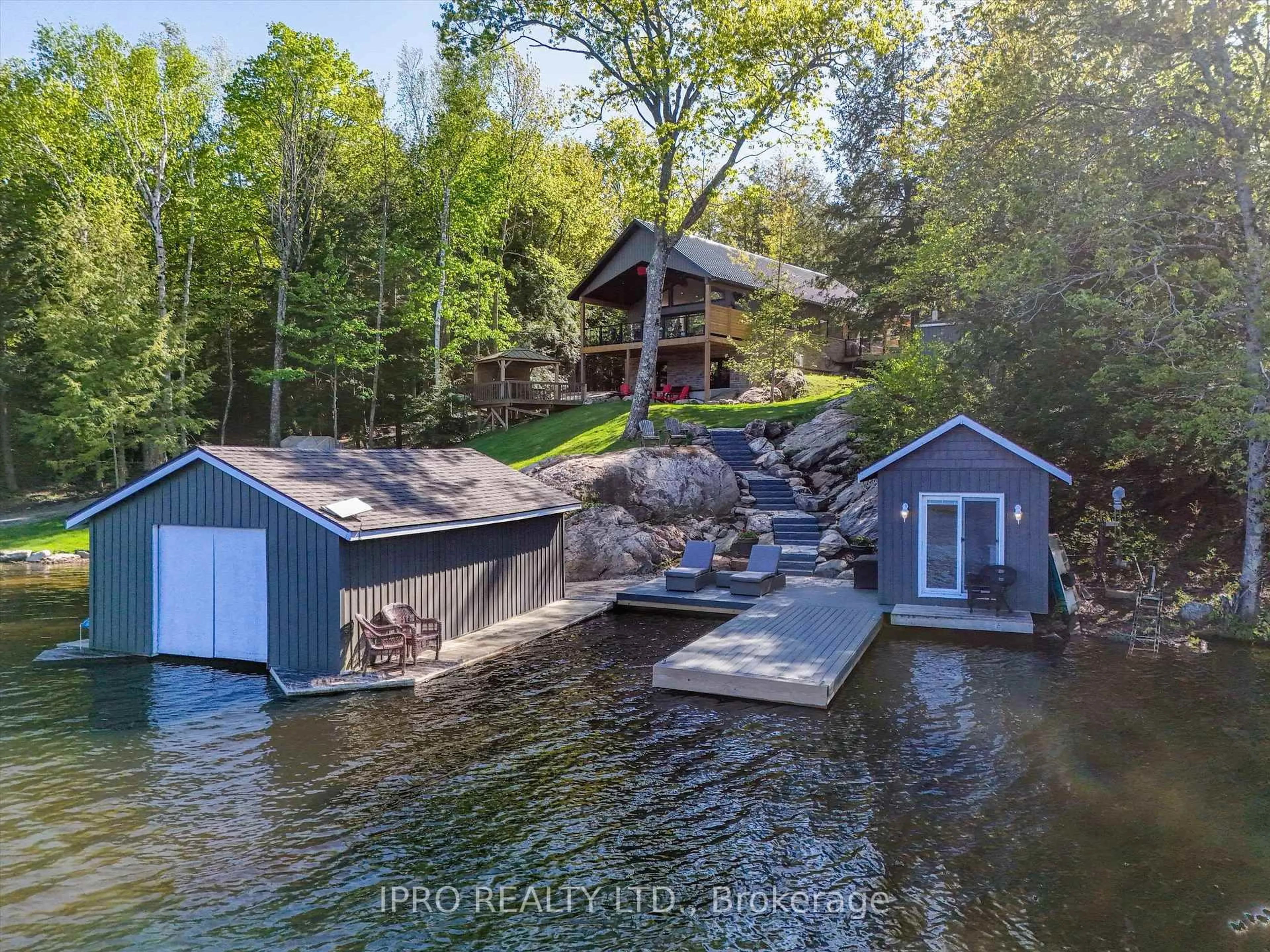 A pic from outside/outdoor area/front of a property/back of a property/a pic from drone, water/lake/river/ocean view for 1907 Island Rd, Severn Ontario L0K 1E0