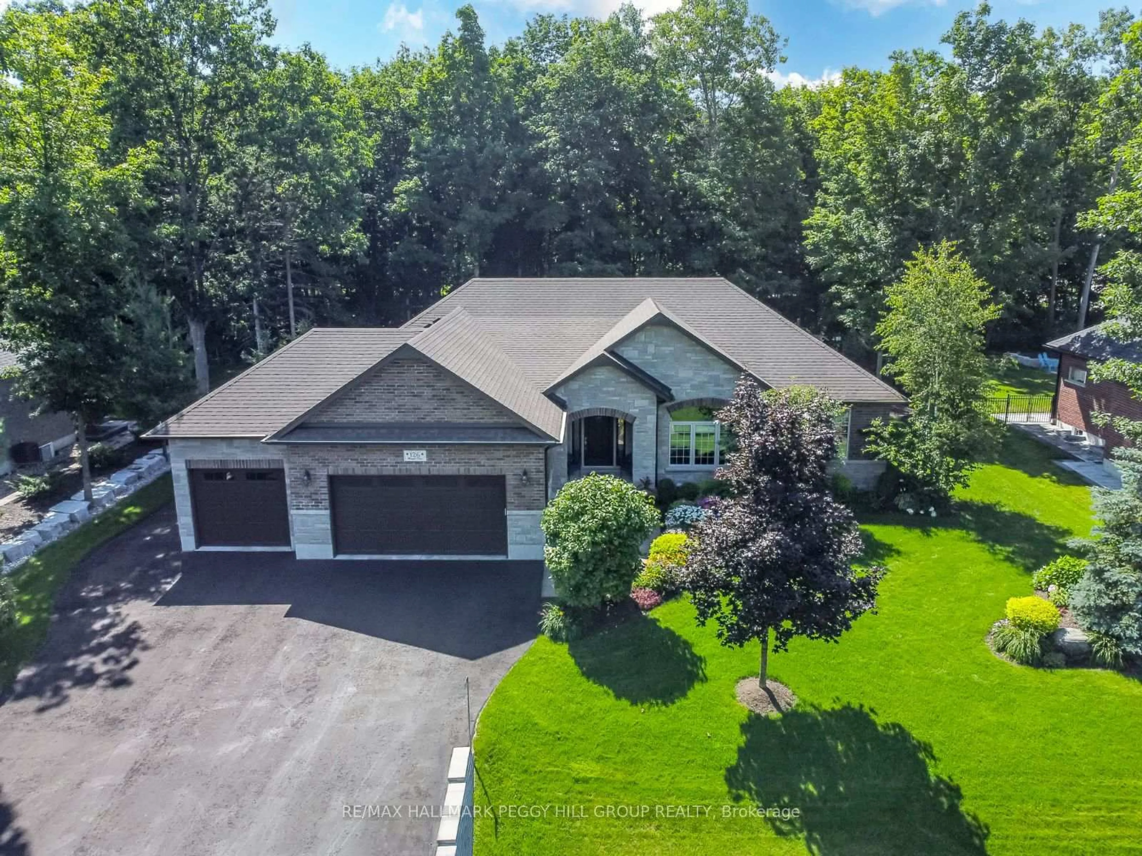 A pic from outside/outdoor area/front of a property/back of a property/a pic from drone, unknown for 126 Mennill Dr, Springwater Ontario L9X 0J2