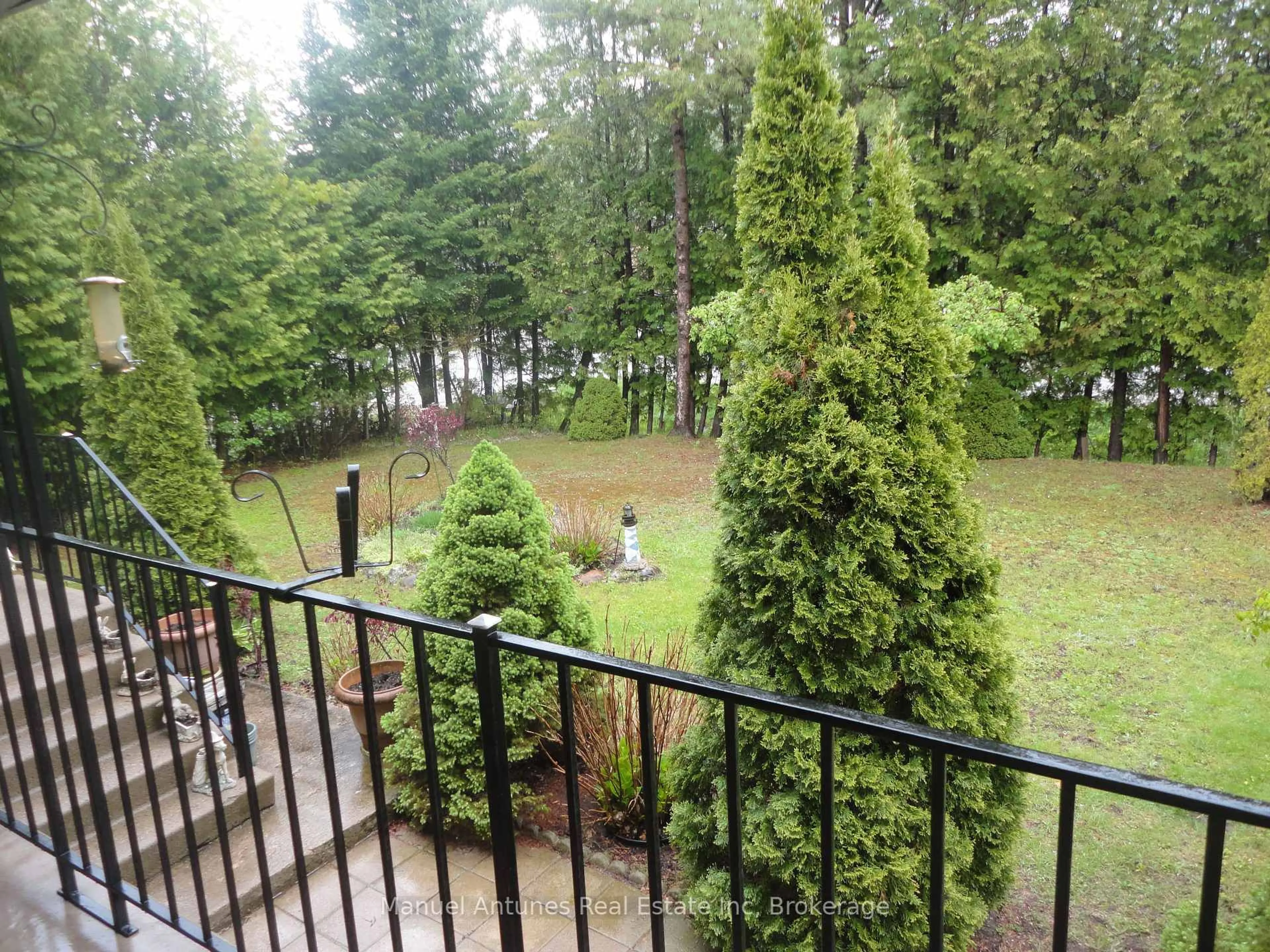 Patio, forest/trees view for 34 42nd St, Wasaga Beach Ontario L9Z 1Z7