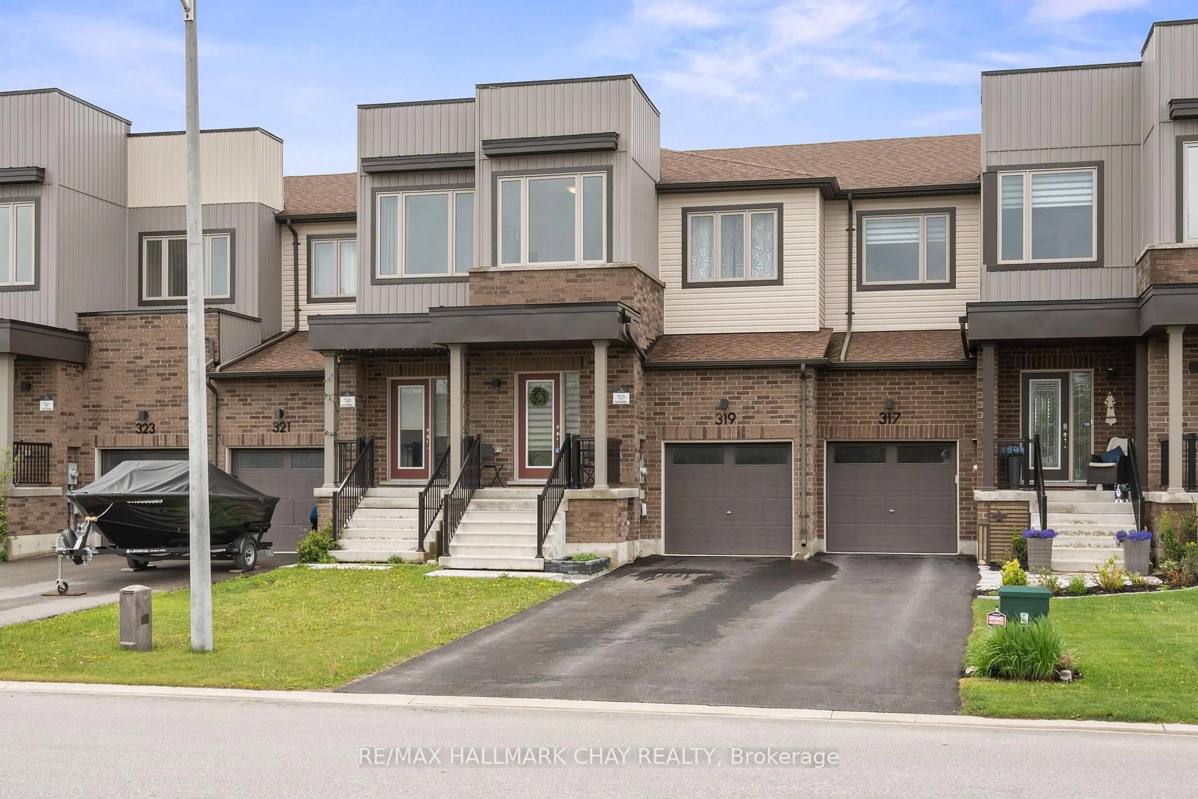 Home with brick exterior material, street for 319 ATKINSON St, Clearview Ontario L0M 1S0
