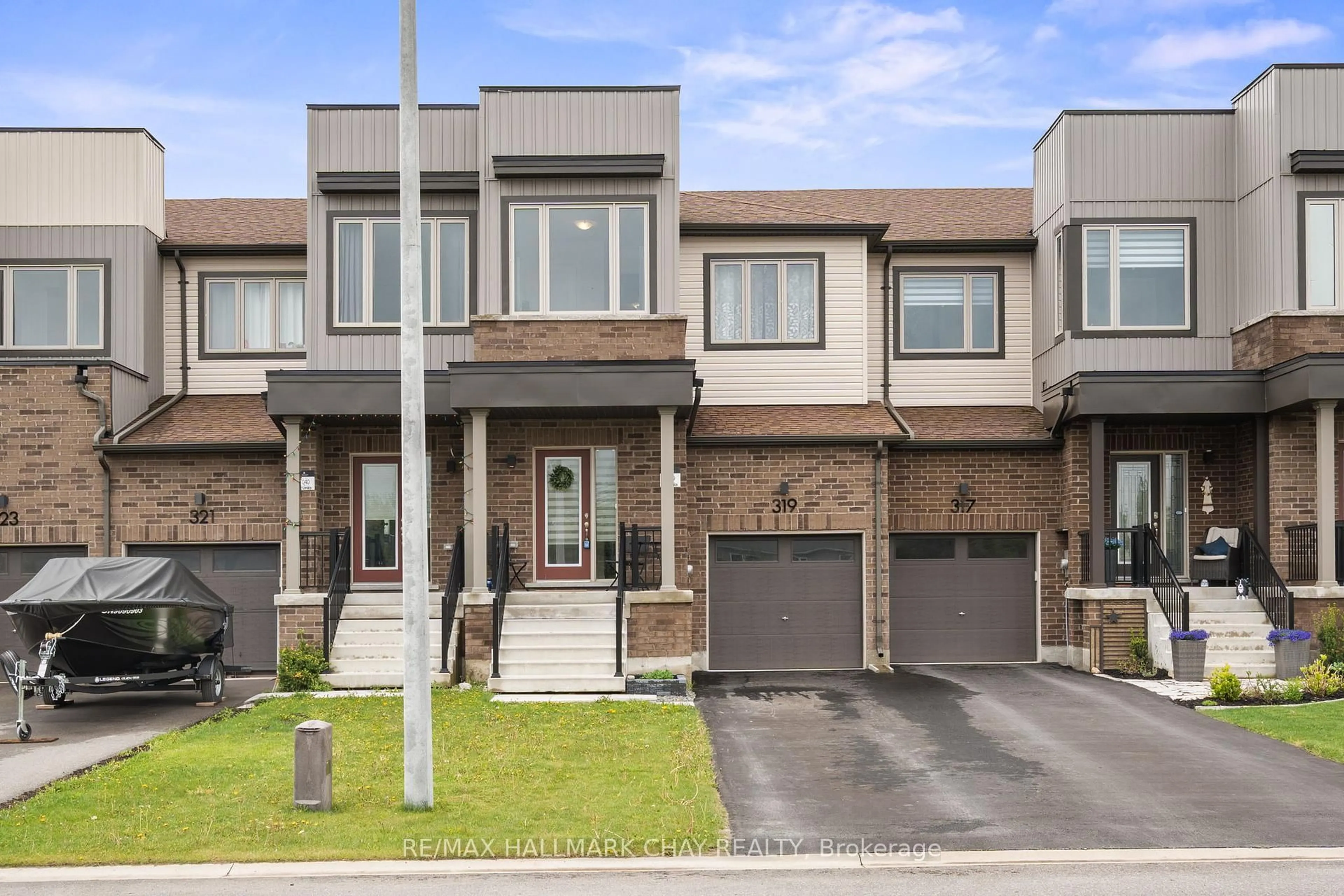 Home with brick exterior material, street for 319 ATKINSON St, Clearview Ontario L0M 1S0