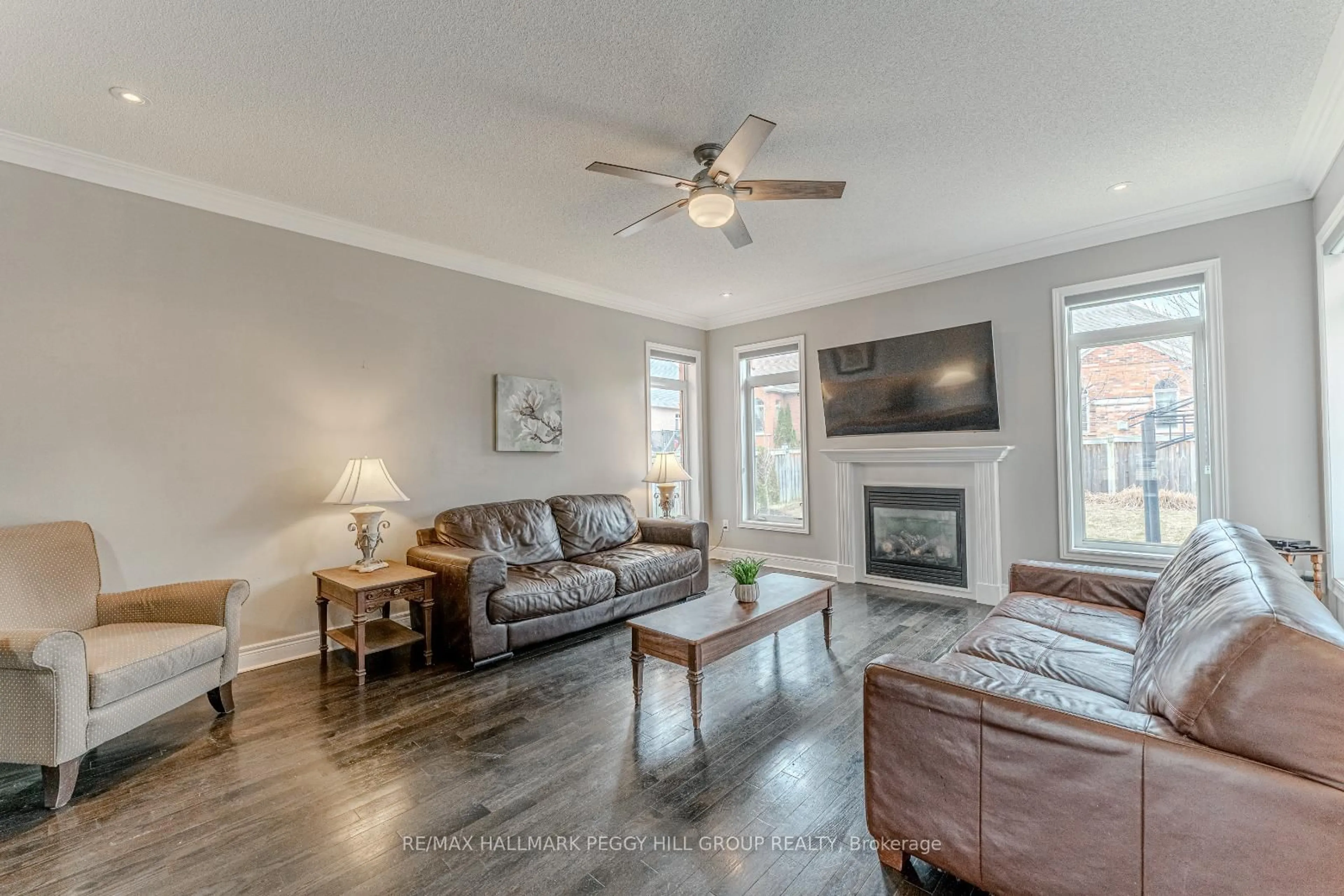 Living room with furniture, wood/laminate floor for 35 Royal Park Blvd, Barrie Ontario L4N 6M8
