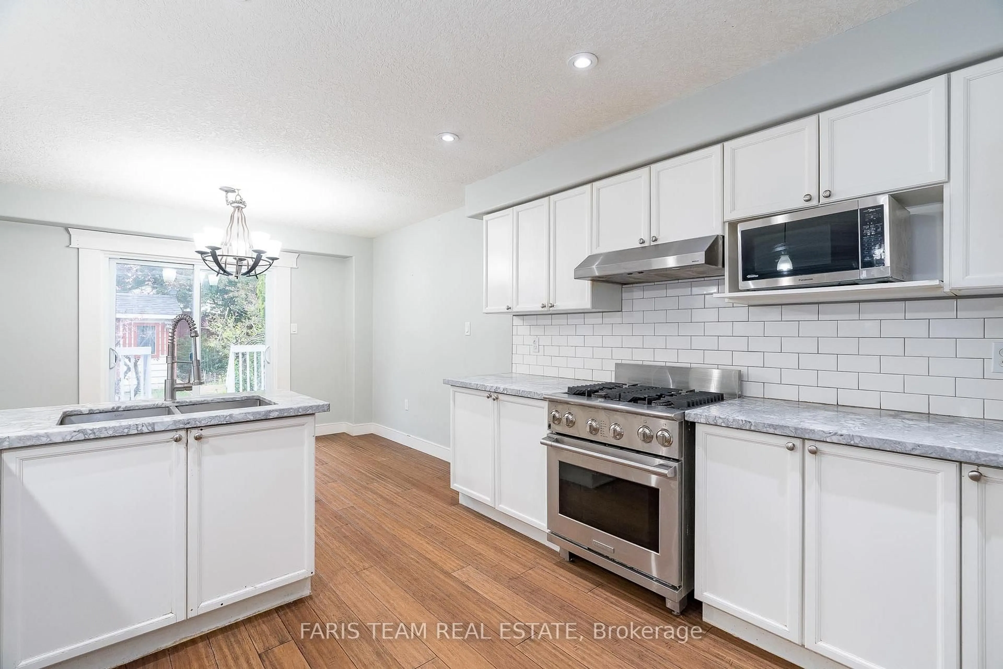 Open concept kitchen, unknown for 15 Dunsmore Lane, Barrie Ontario L4M 7A1