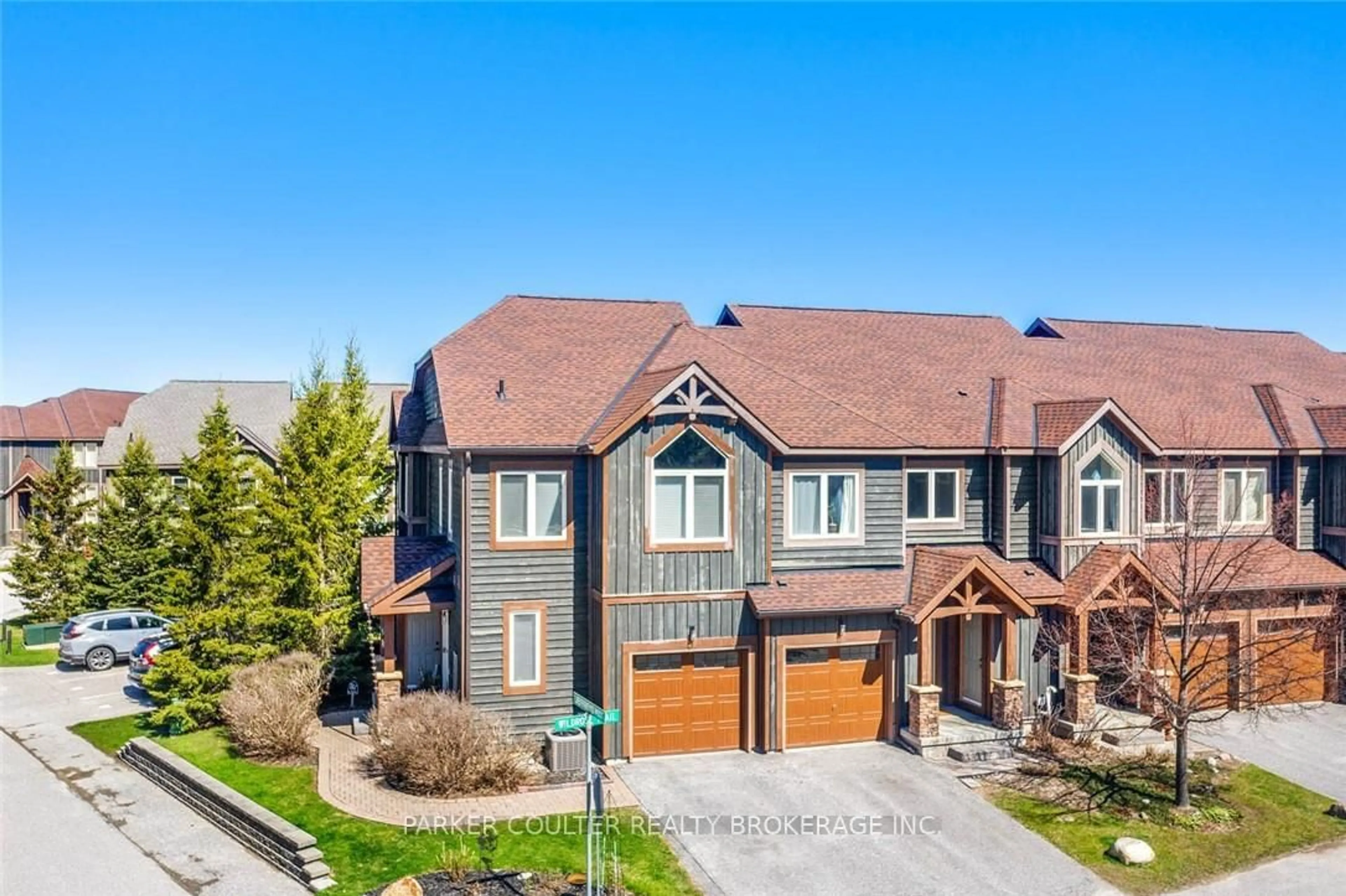 A pic from outside/outdoor area/front of a property/back of a property/a pic from drone, street for 20 Wildrose Tr #42, Collingwood Ontario L9Y 0J4