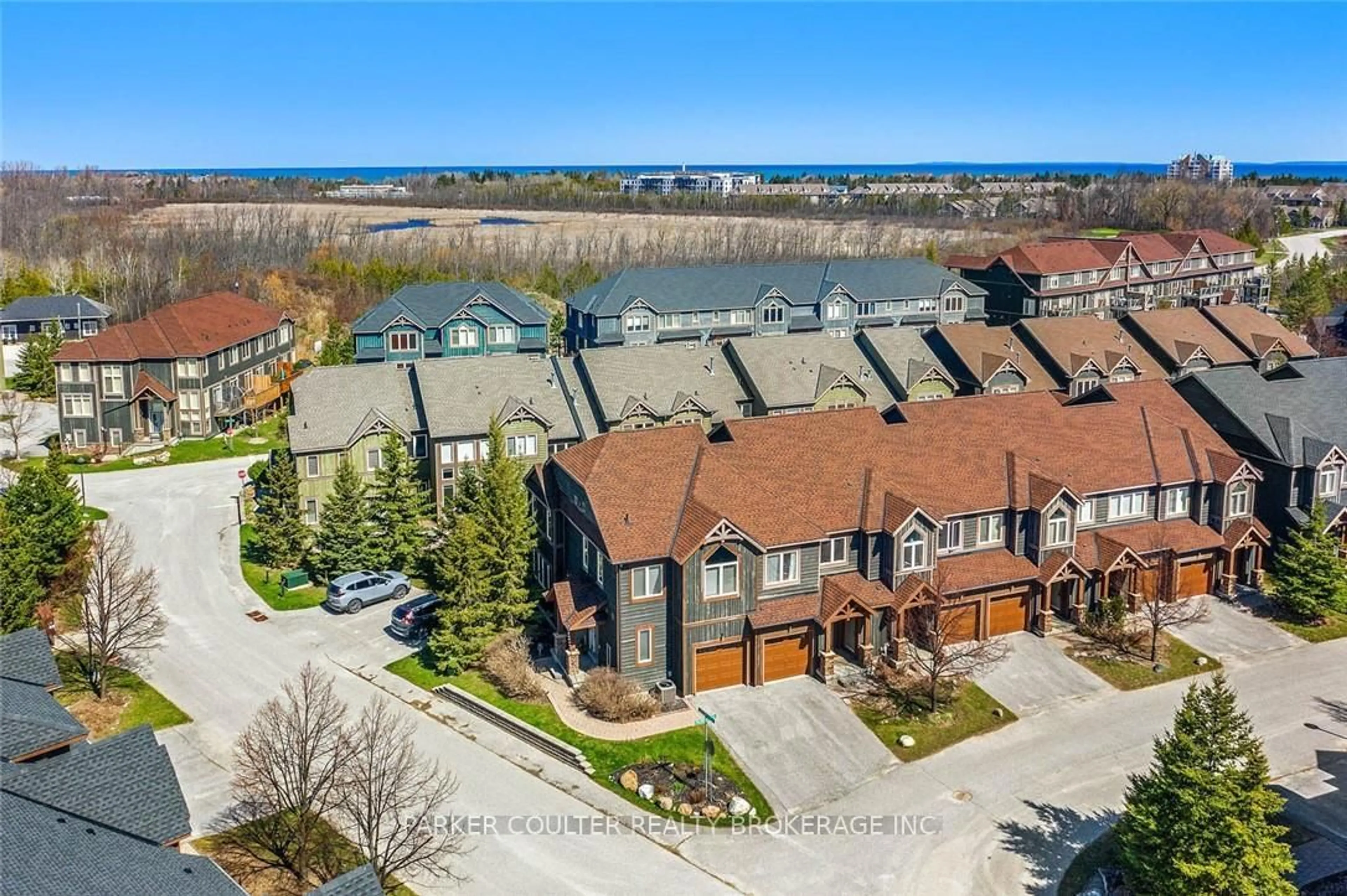 A pic from outside/outdoor area/front of a property/back of a property/a pic from drone, water/lake/river/ocean view for 20 Wildrose Tr #42, Collingwood Ontario L9Y 0J4
