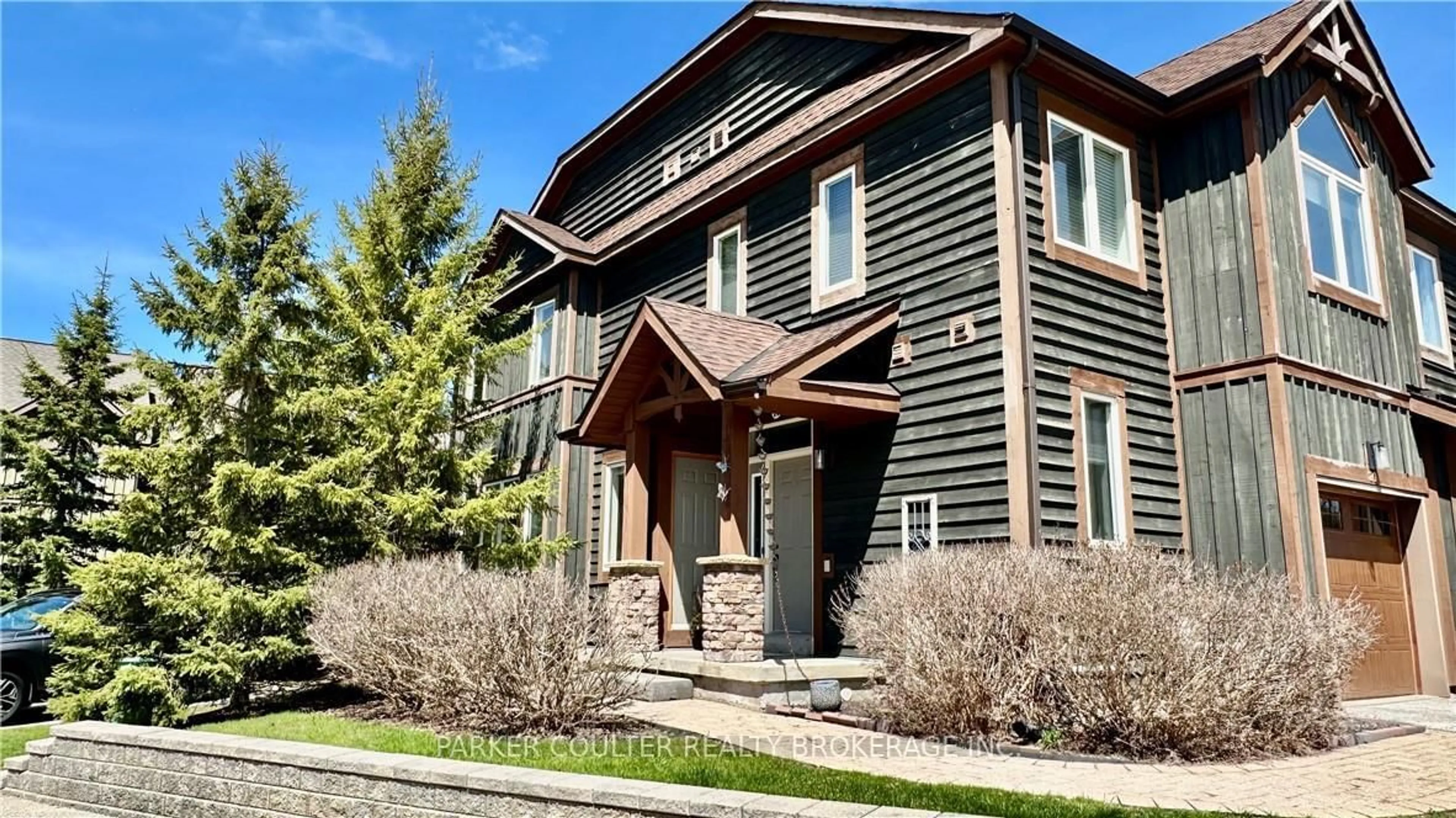 Home with brick exterior material, street for 20 Wildrose Tr #42, Collingwood Ontario L9Y 0J4