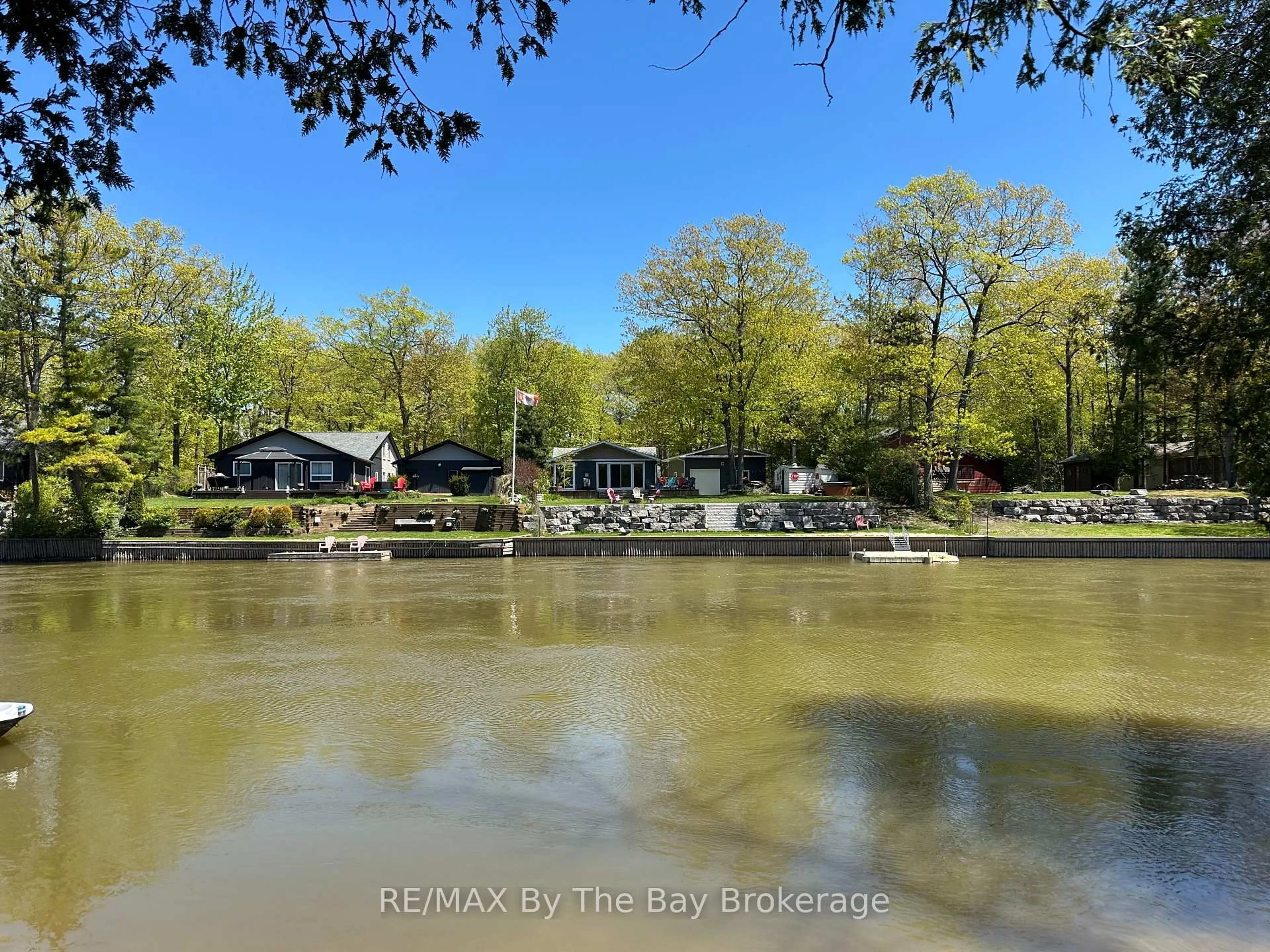 A pic from outside/outdoor area/front of a property/back of a property/a pic from drone, water/lake/river/ocean view for 159 Sunnidale Rd, Wasaga Beach Ontario L9Z 2S9