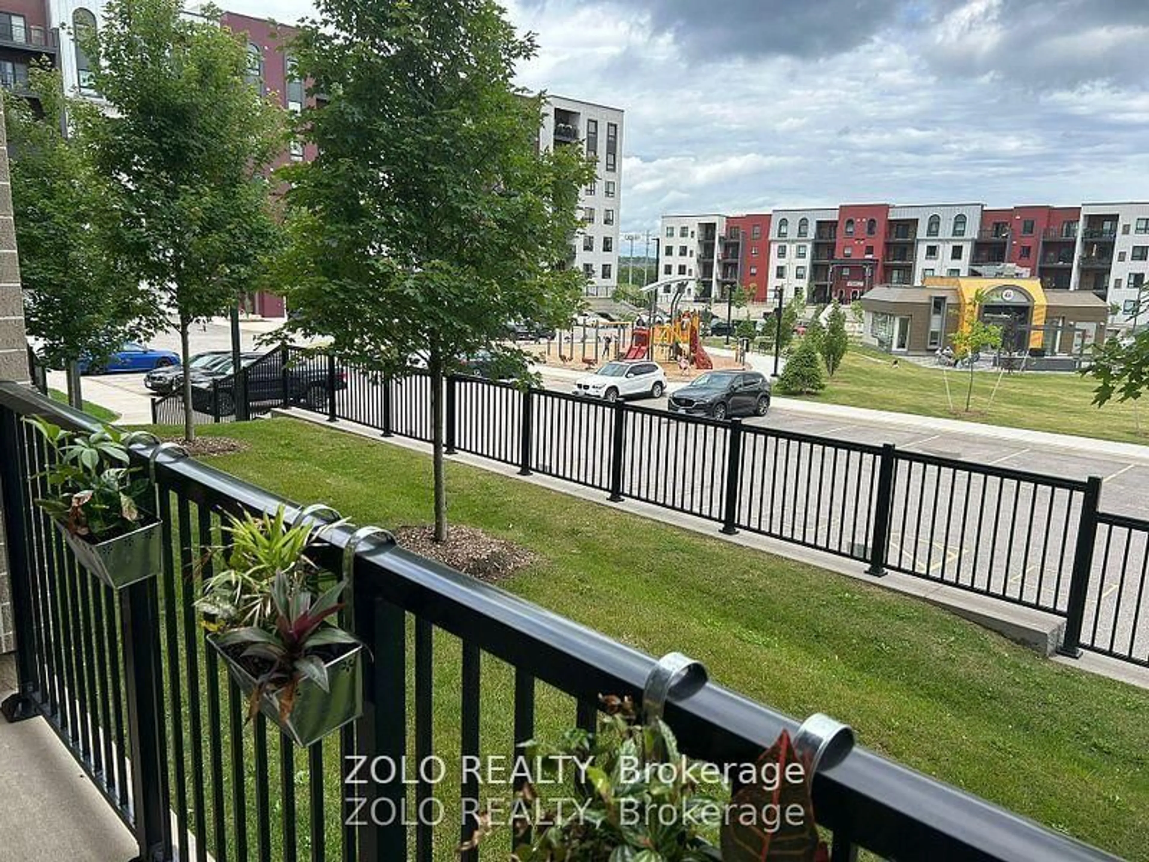 A pic from outside/outdoor area/front of a property/back of a property/a pic from drone, city buildings view from balcony for 6 Spice Way #101, Barrie Ontario L9J 0J9
