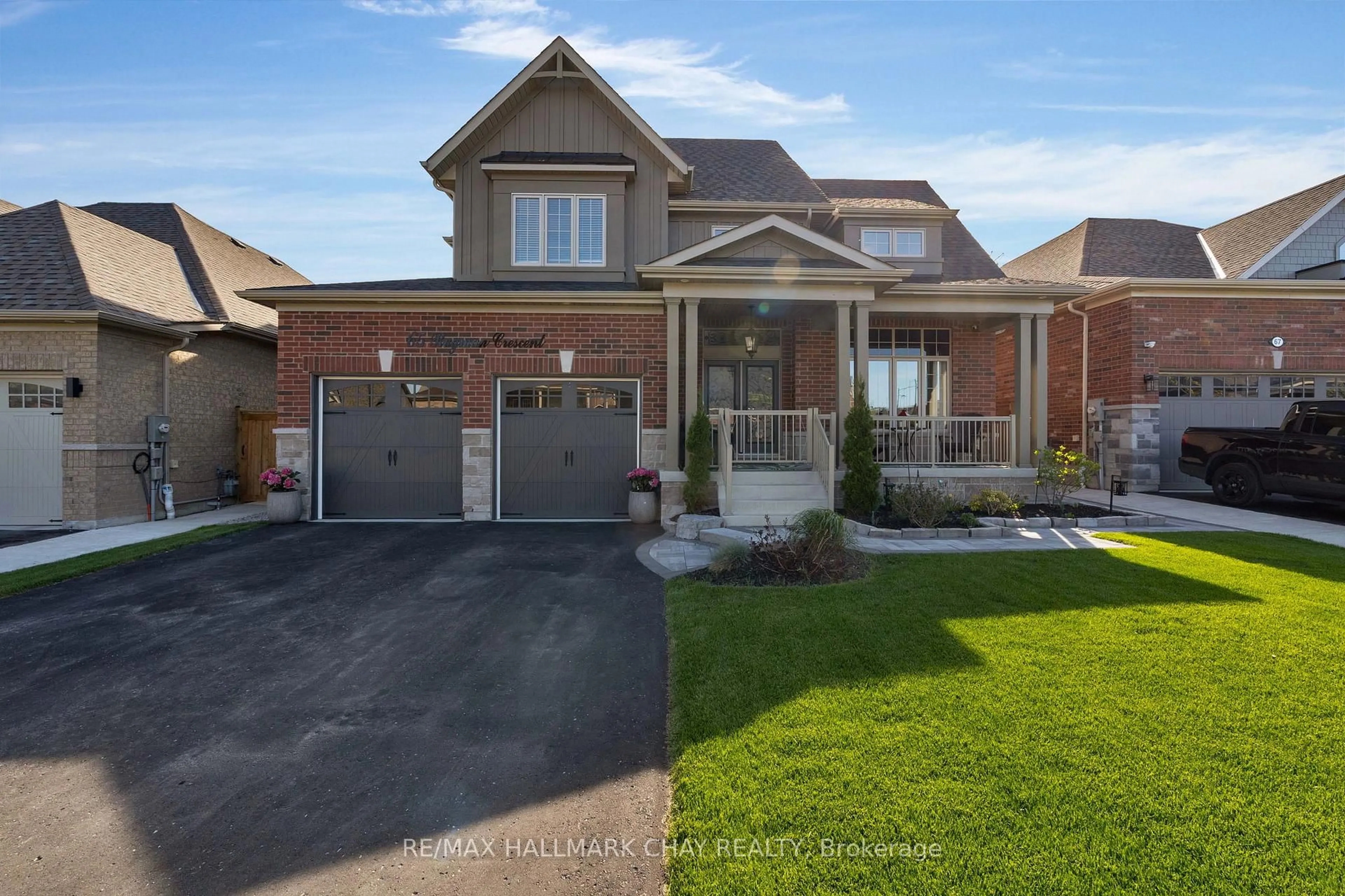 Home with brick exterior material, street for 65 Rugman Cres, Springwater Ontario L9X 2A4