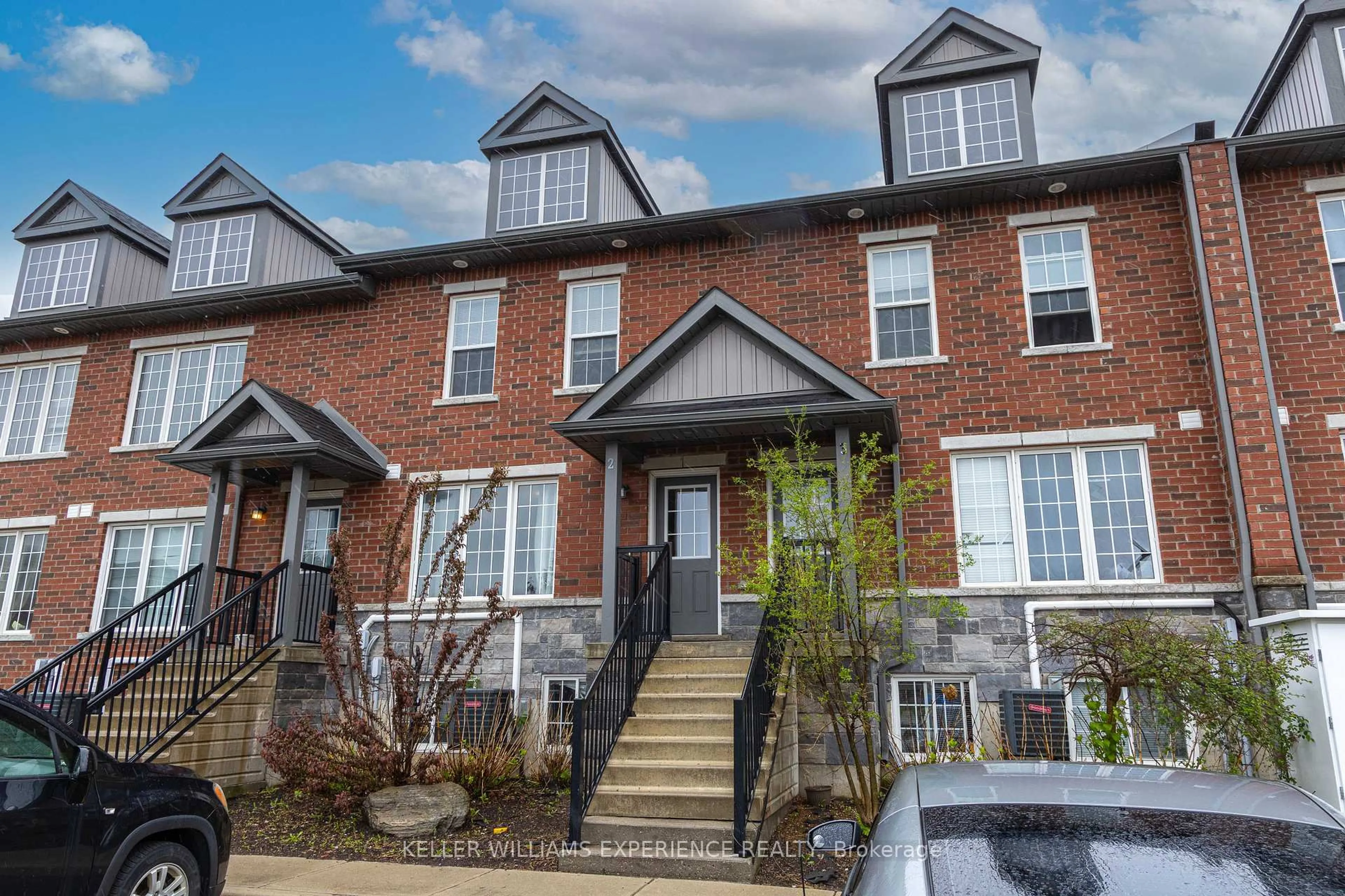 Home with brick exterior material, street for 242 Penetanguishene Rd #2, Barrie Ontario L4M 7C2