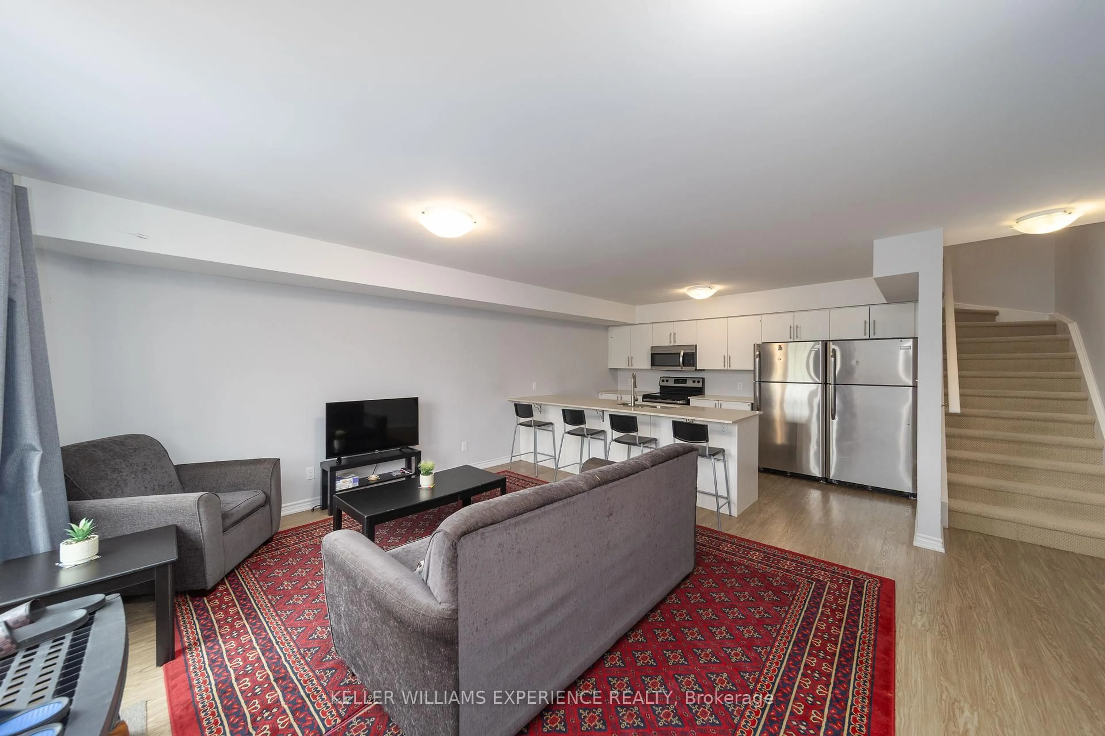 Living room with furniture, unknown for 242 Penetanguishene Rd #2, Barrie Ontario L4M 7C2