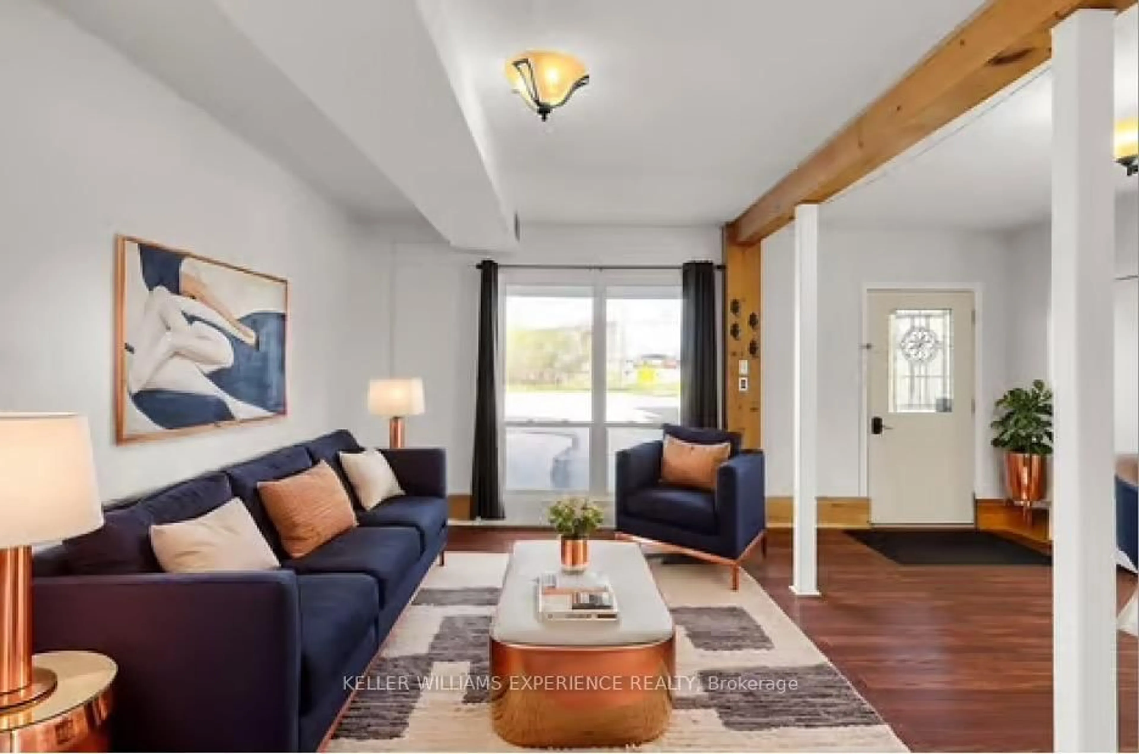 Living room with furniture, wood/laminate floor for 3 Courtland St, Orillia Ontario L3V 1A4