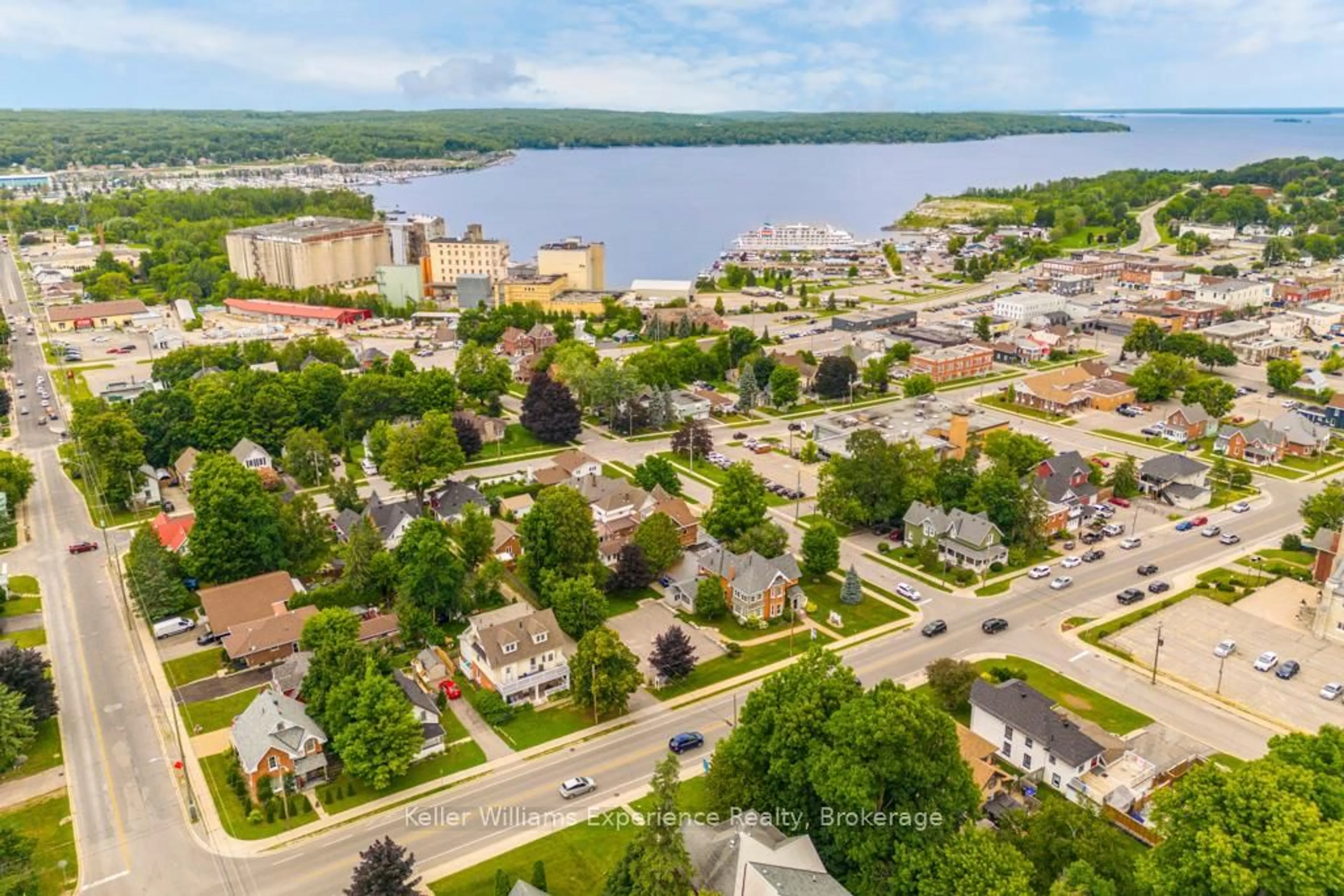 A pic from outside/outdoor area/front of a property/back of a property/a pic from drone, water/lake/river/ocean view for 600 HUGEL Ave, Midland Ontario L4R 1W4