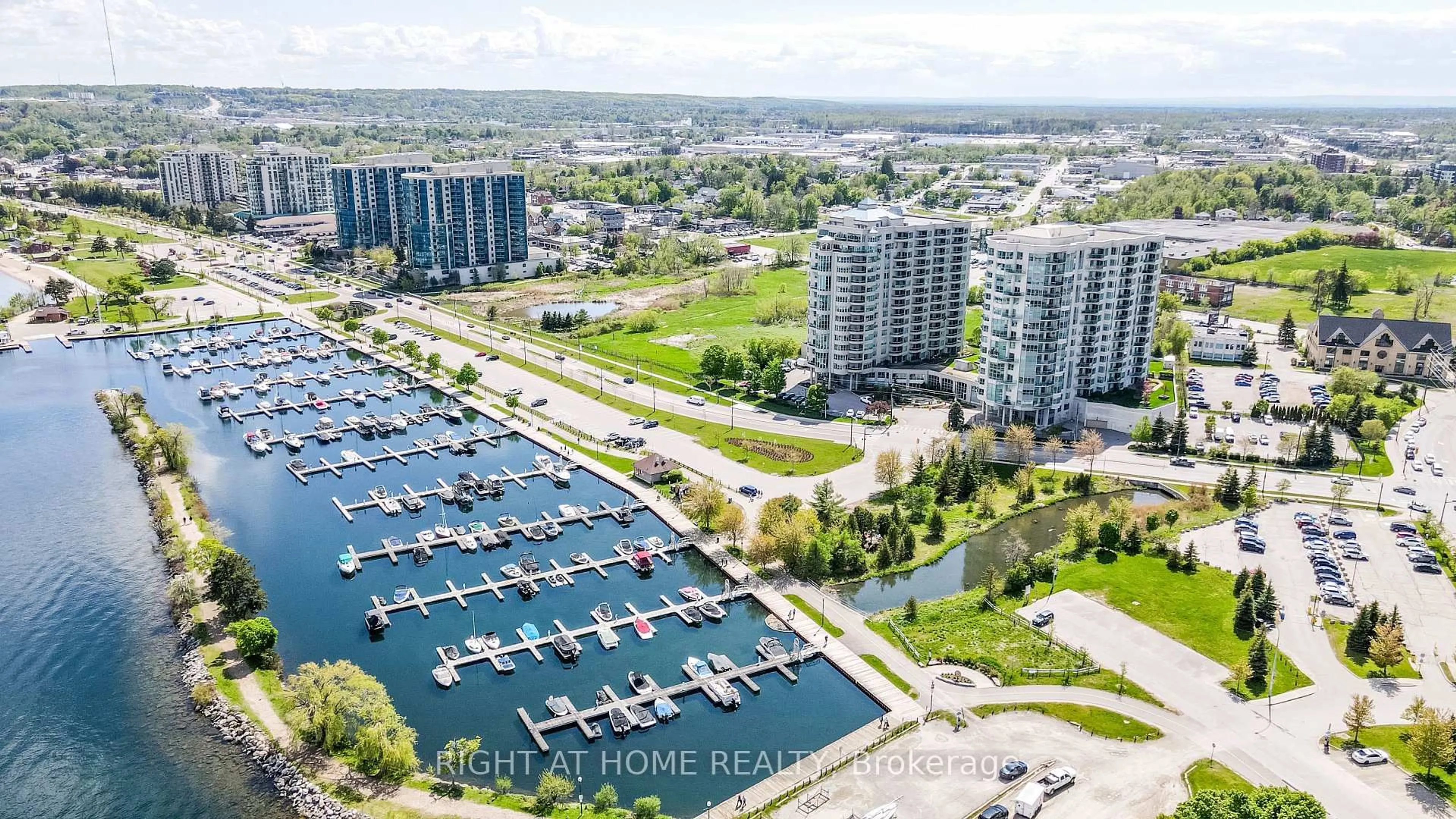 A pic from outside/outdoor area/front of a property/back of a property/a pic from drone, water/lake/river/ocean view for 6 Toronto St #PH08, Barrie Ontario L4N 9R2