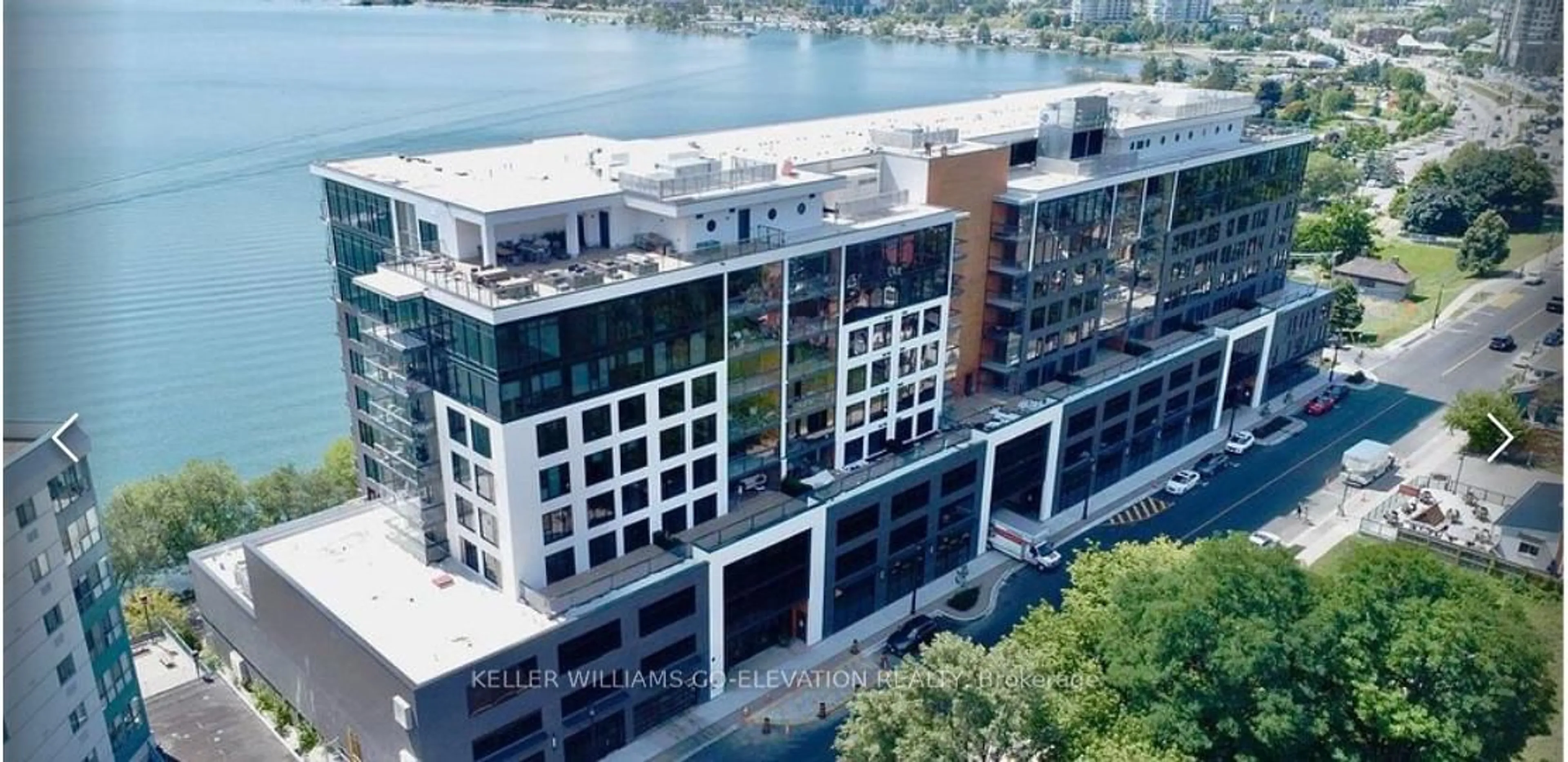 A pic from outside/outdoor area/front of a property/back of a property/a pic from drone, water/lake/river/ocean view for 185 Dunlop St #414, Barrie Ontario L4M 1B2