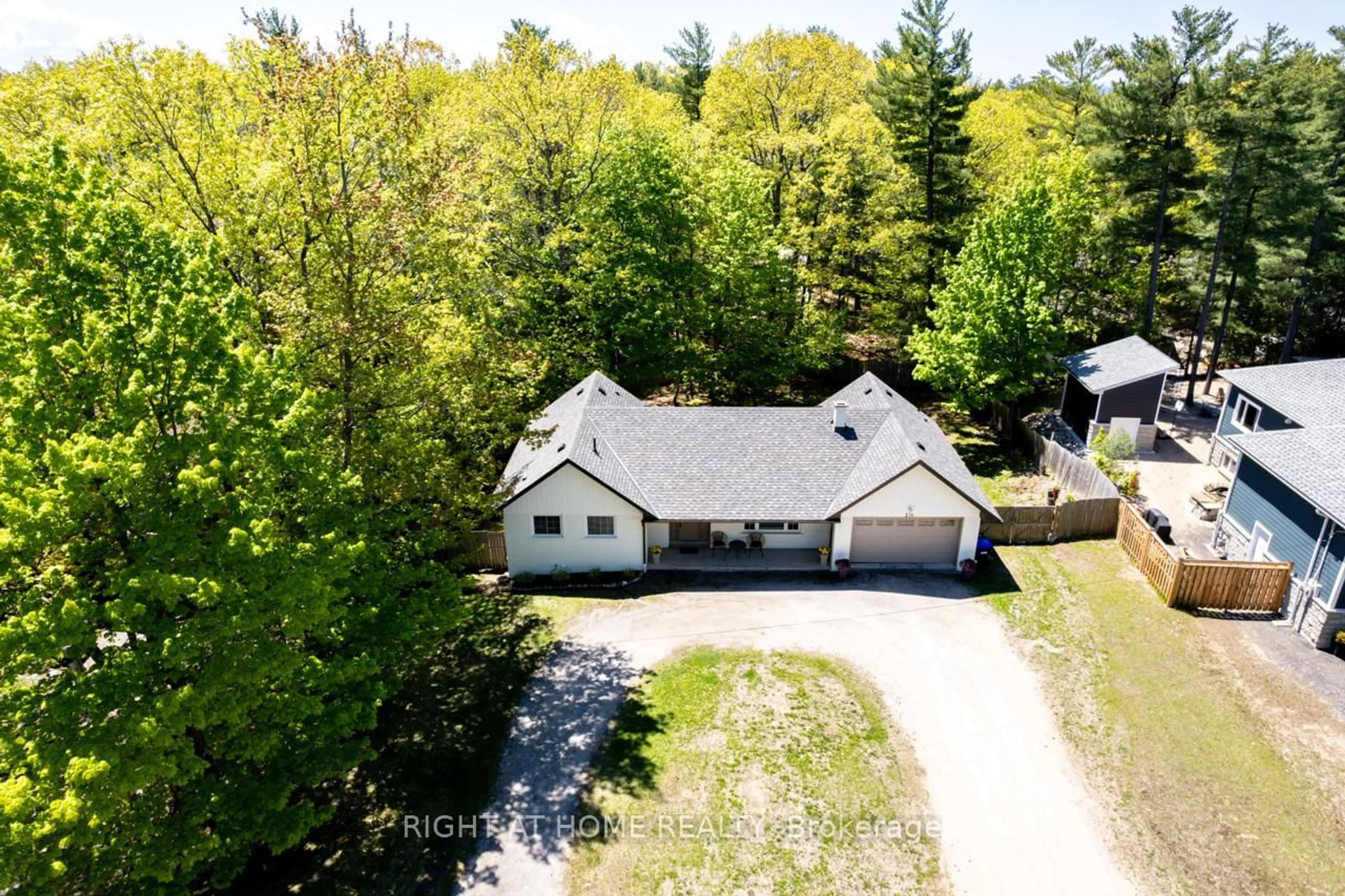 A pic from outside/outdoor area/front of a property/back of a property/a pic from drone, street for 214 Desroches Tr, Tiny Ontario L9M 0H9