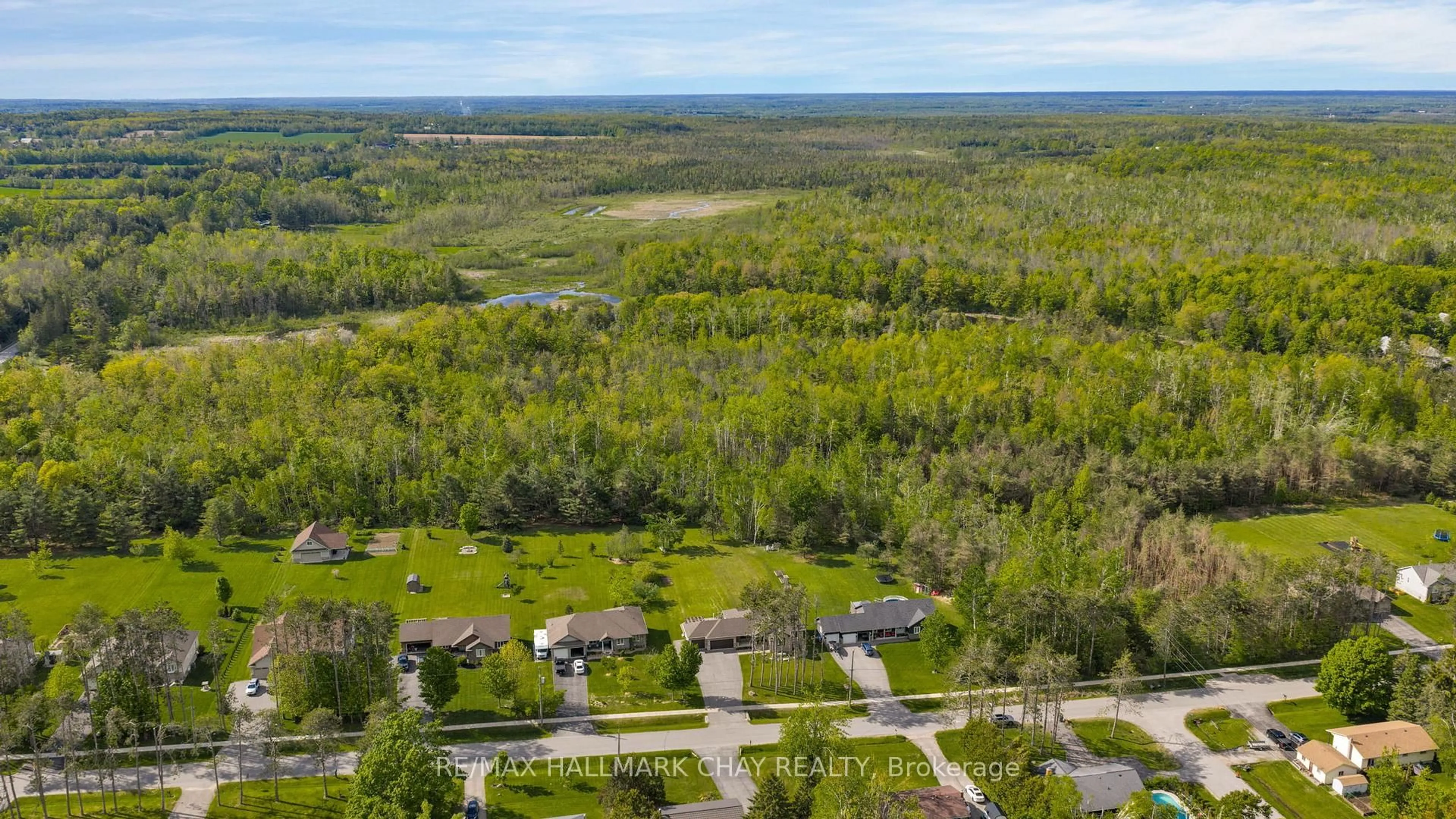 A pic from outside/outdoor area/front of a property/back of a property/a pic from drone, forest/trees view for 2052 MARCHMONT Rd, Severn Ontario L3V 6H2