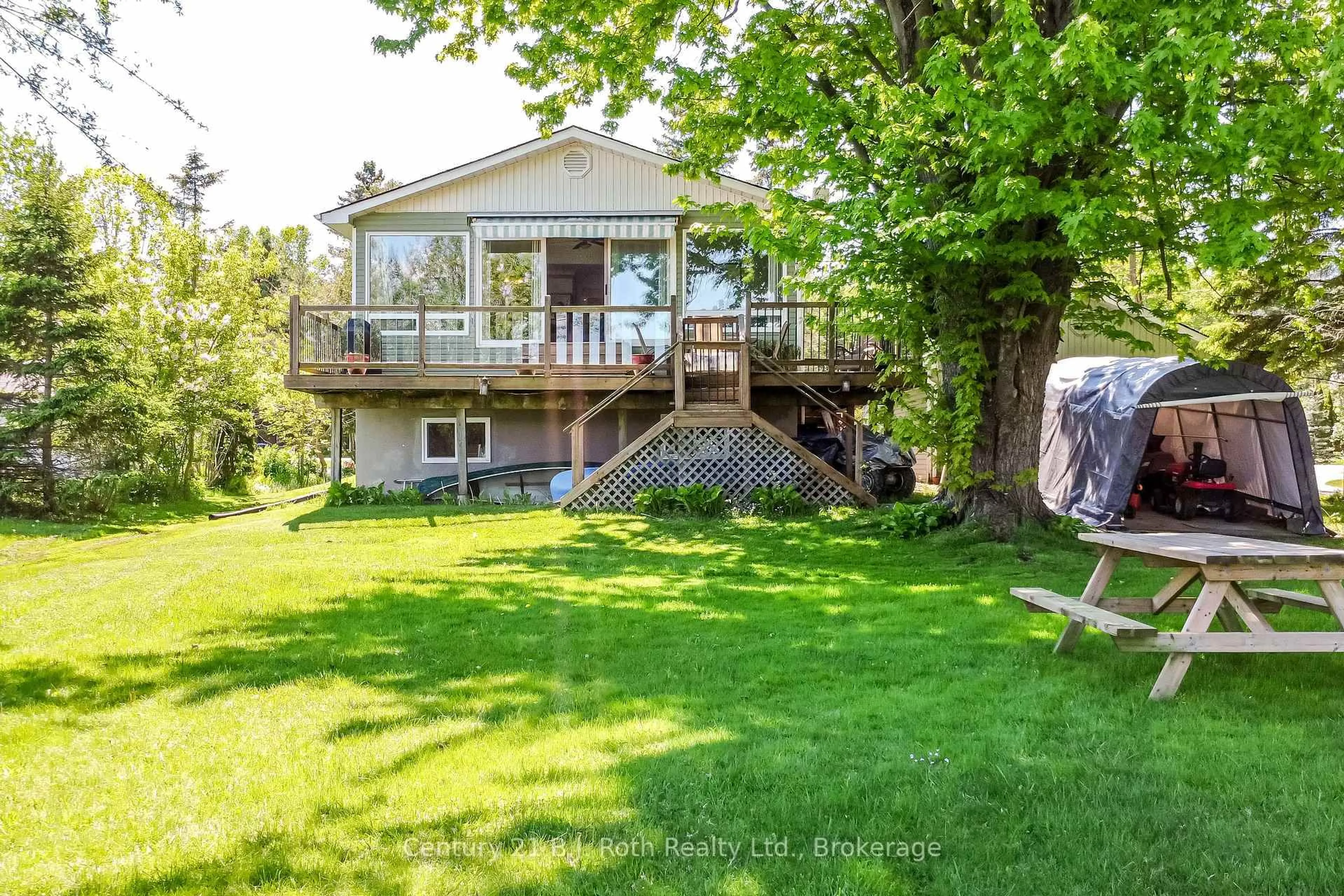 A pic from outside/outdoor area/front of a property/back of a property/a pic from drone, water/lake/river/ocean view for 95 Maskinonge Rd, Tay Ontario L0K 2A0