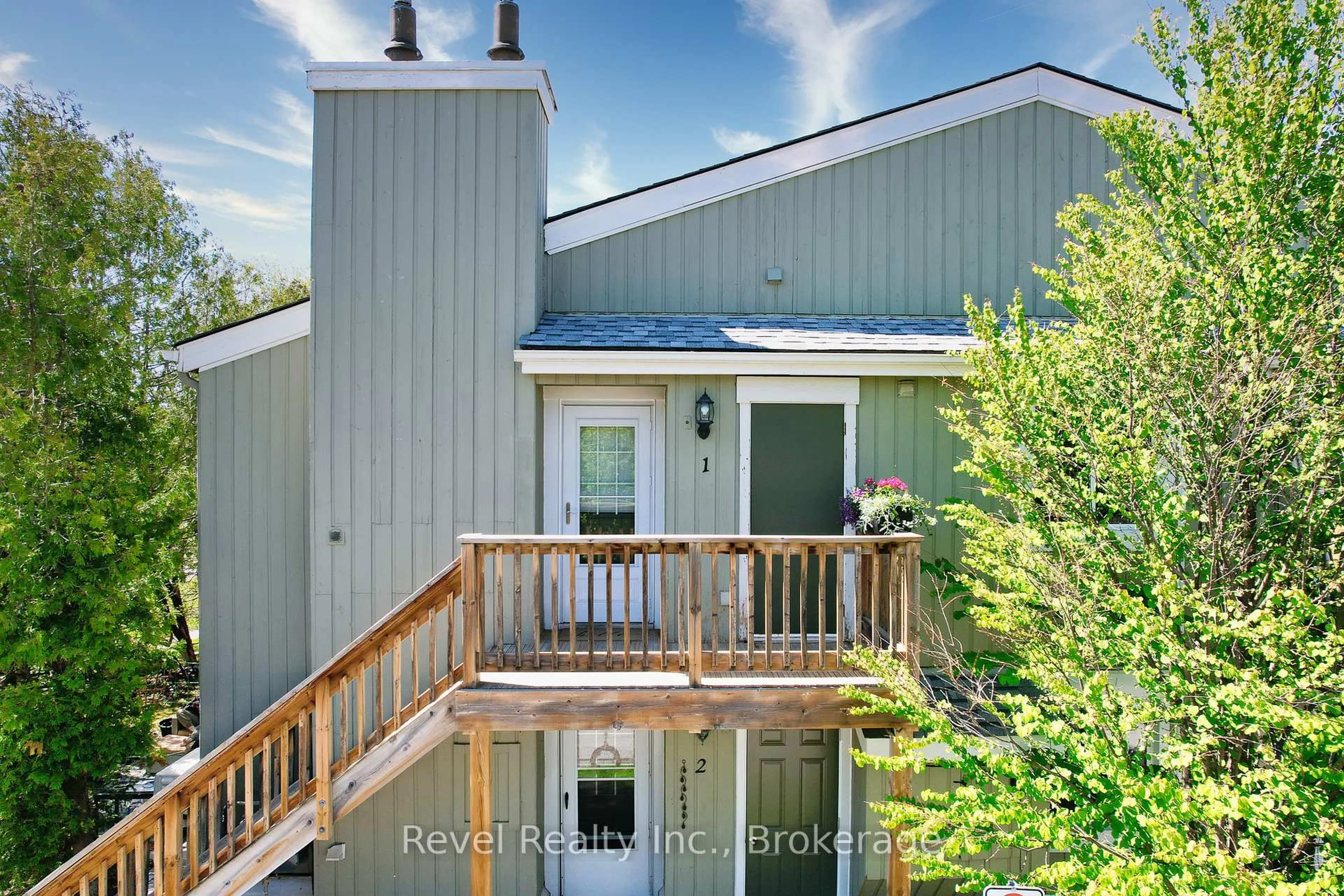 A pic from outside/outdoor area/front of a property/back of a property/a pic from drone, water/lake/river/ocean view for 15 Dawson Dr #1, Collingwood Ontario L9Y 5B4