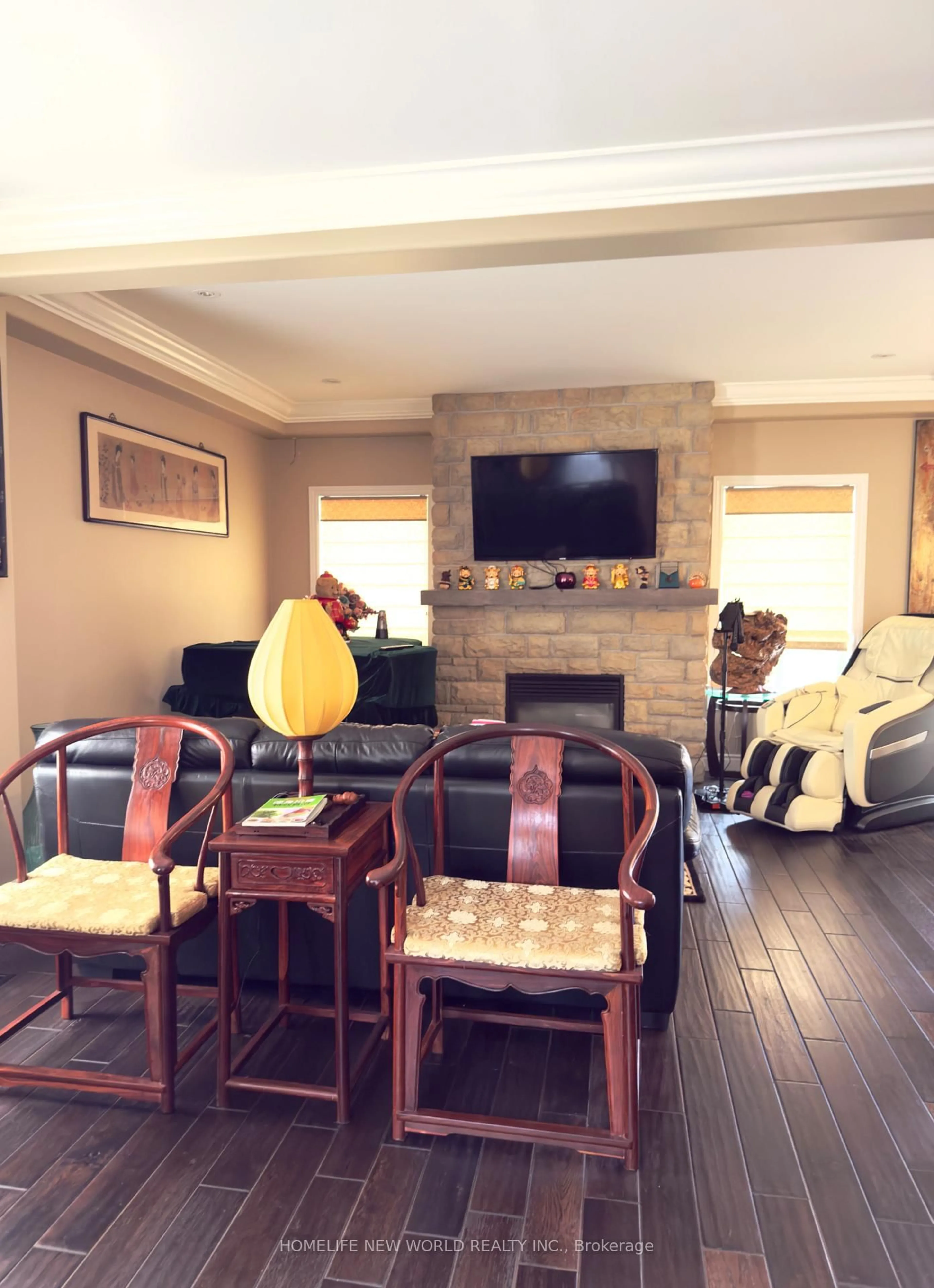 Living room with furniture, wood/laminate floor for 26 Stuart Ave, Barrie Ontario L4M 0A2