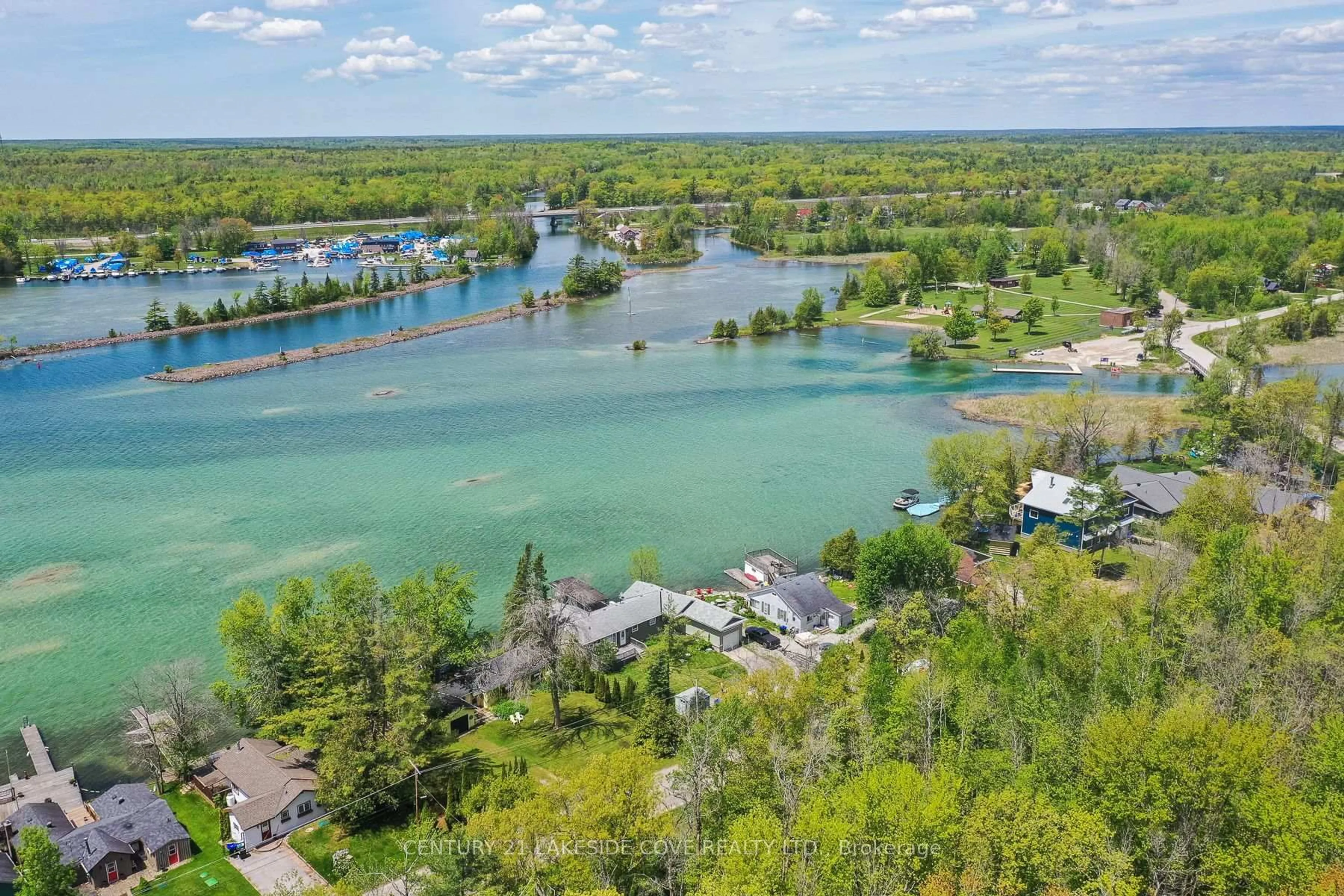 A pic from outside/outdoor area/front of a property/back of a property/a pic from drone, water/lake/river/ocean view for 7712 Oak Point Rd, Ramara Ontario L0K 2B0