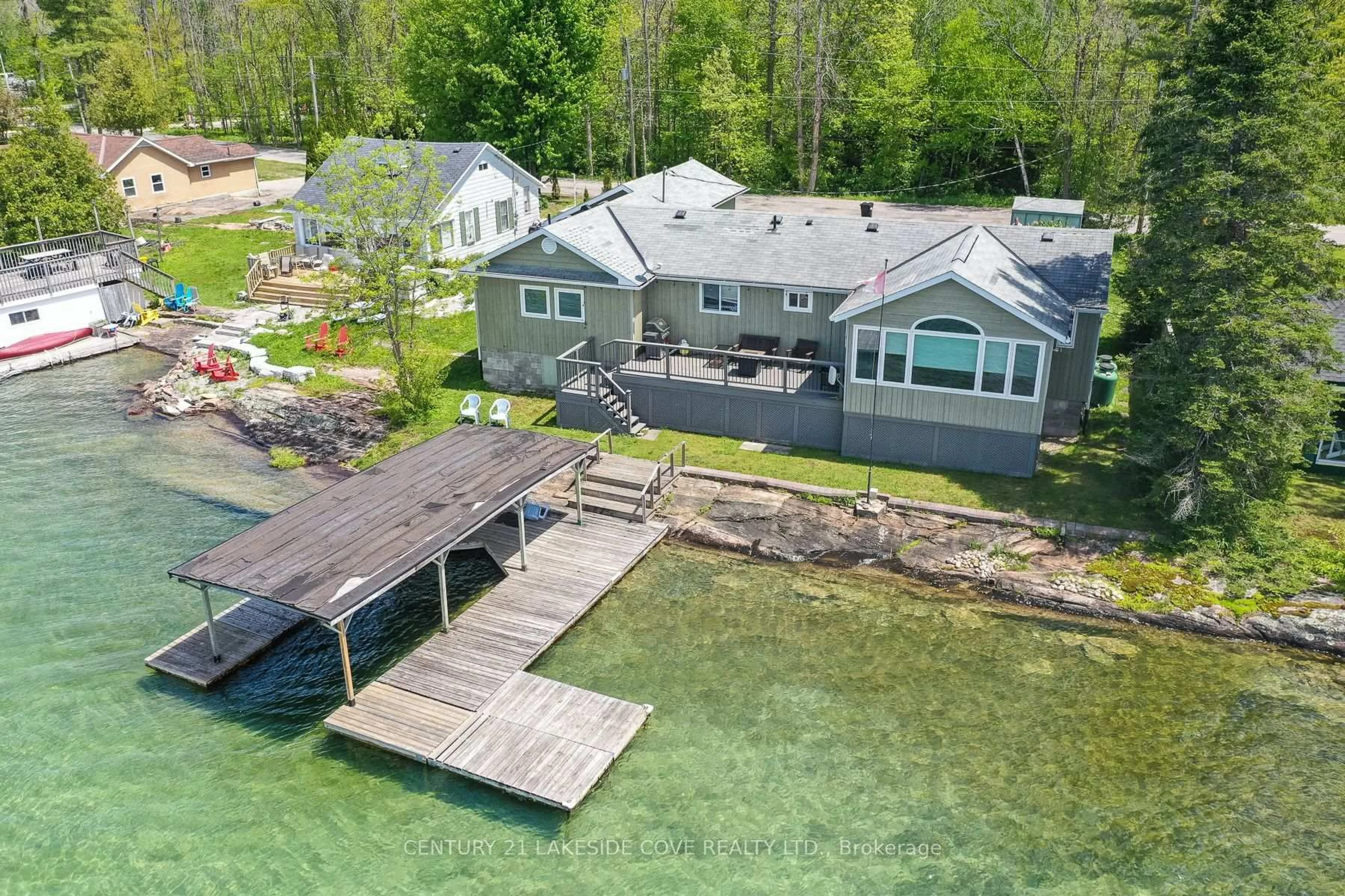 A pic from outside/outdoor area/front of a property/back of a property/a pic from drone, water/lake/river/ocean view for 7712 Oak Point Rd, Ramara Ontario L0K 2B0
